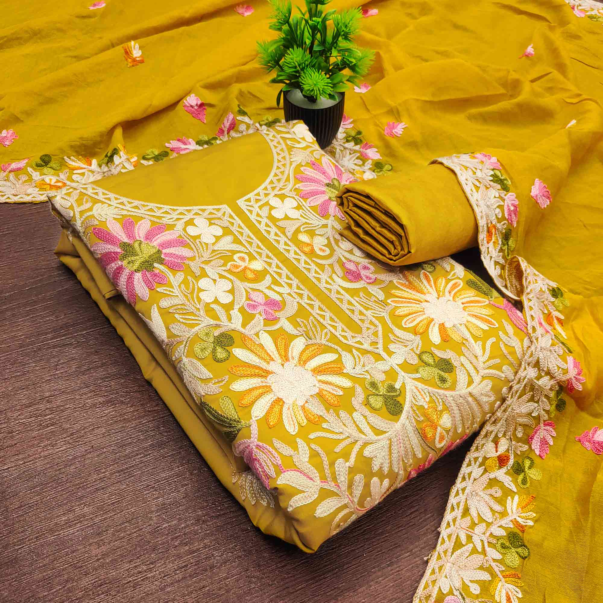 Mustard Designer Roman Art Silk Dress Material Adorned With Floral Thread Embroidery Work