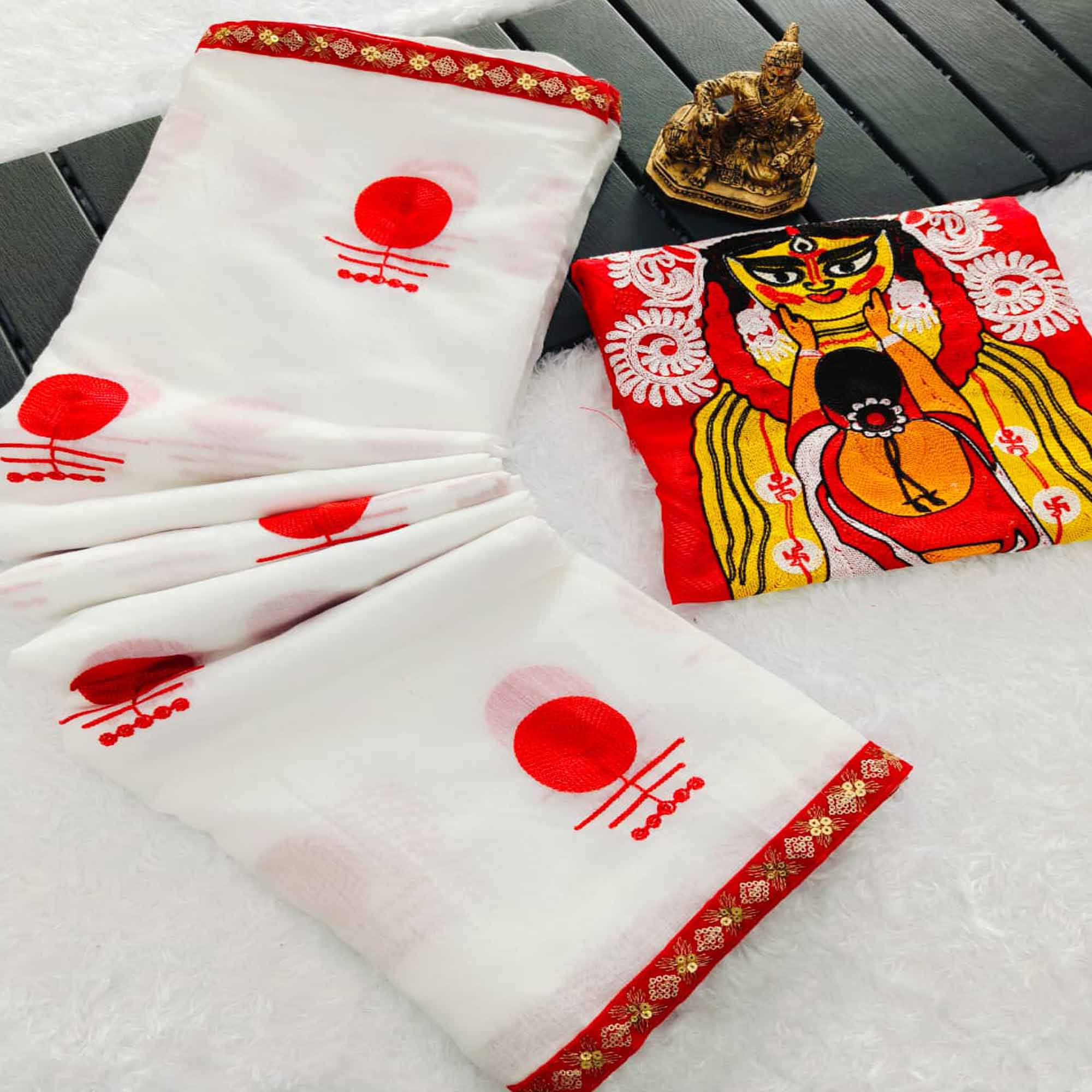 Elegant White Heavy Embroidered Linen Saree for Puja Celebrations