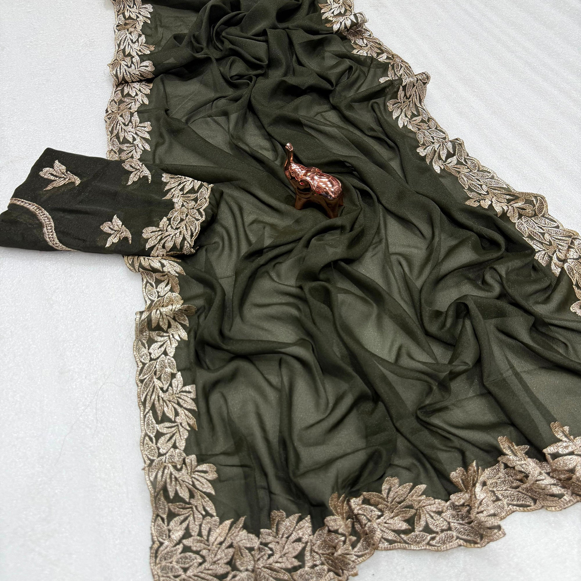 Stylish Mehendi Green Star Chiffon Saree with Traditional Zari Embellished Border