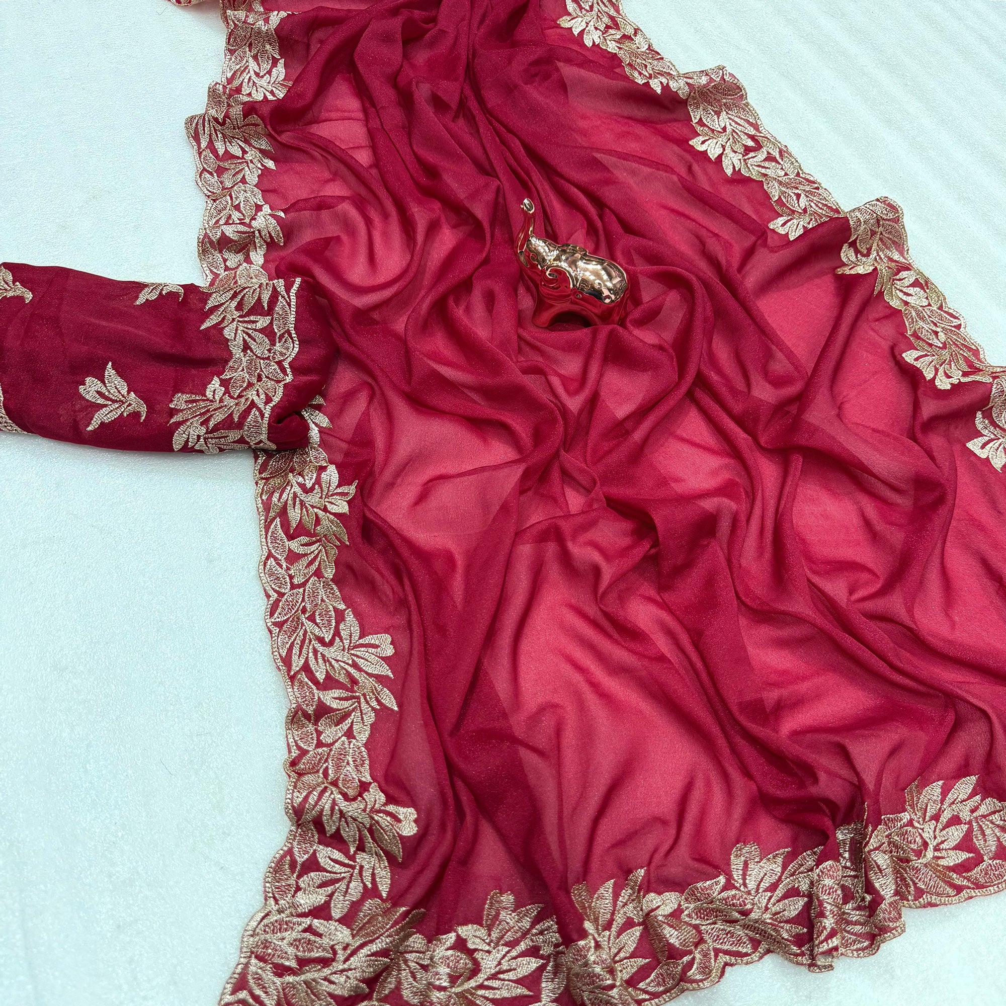 Stylish Pink Star Chiffon Saree with Traditional Zari Embellished Border