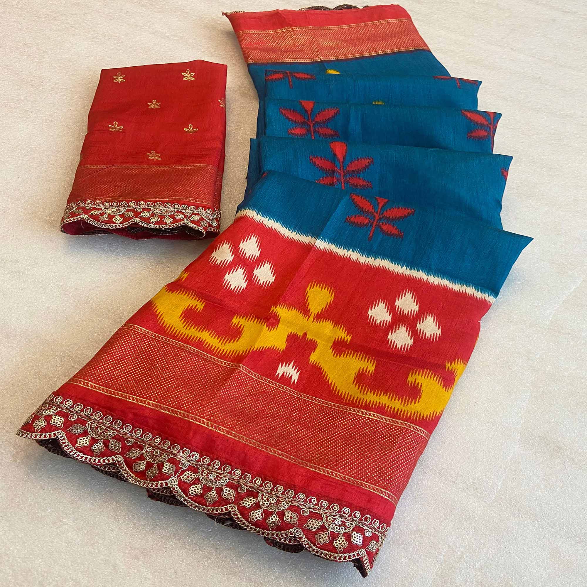 Teal Patola Printed Dola Silk Saree With Sequins Border