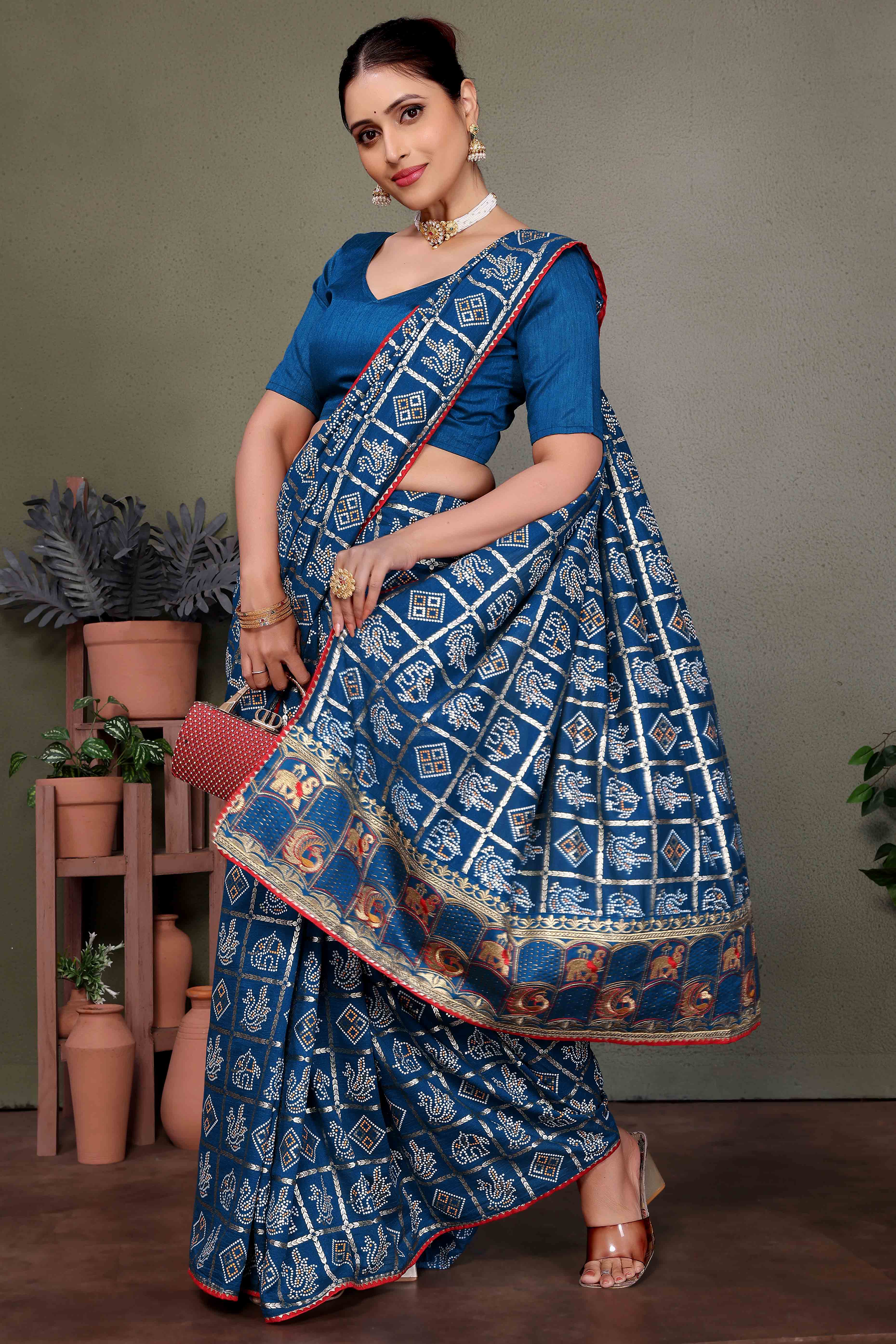 Blue Vichitra Silk Saree Featuring Bandhani Patterns and Graceful Embroidered Borders