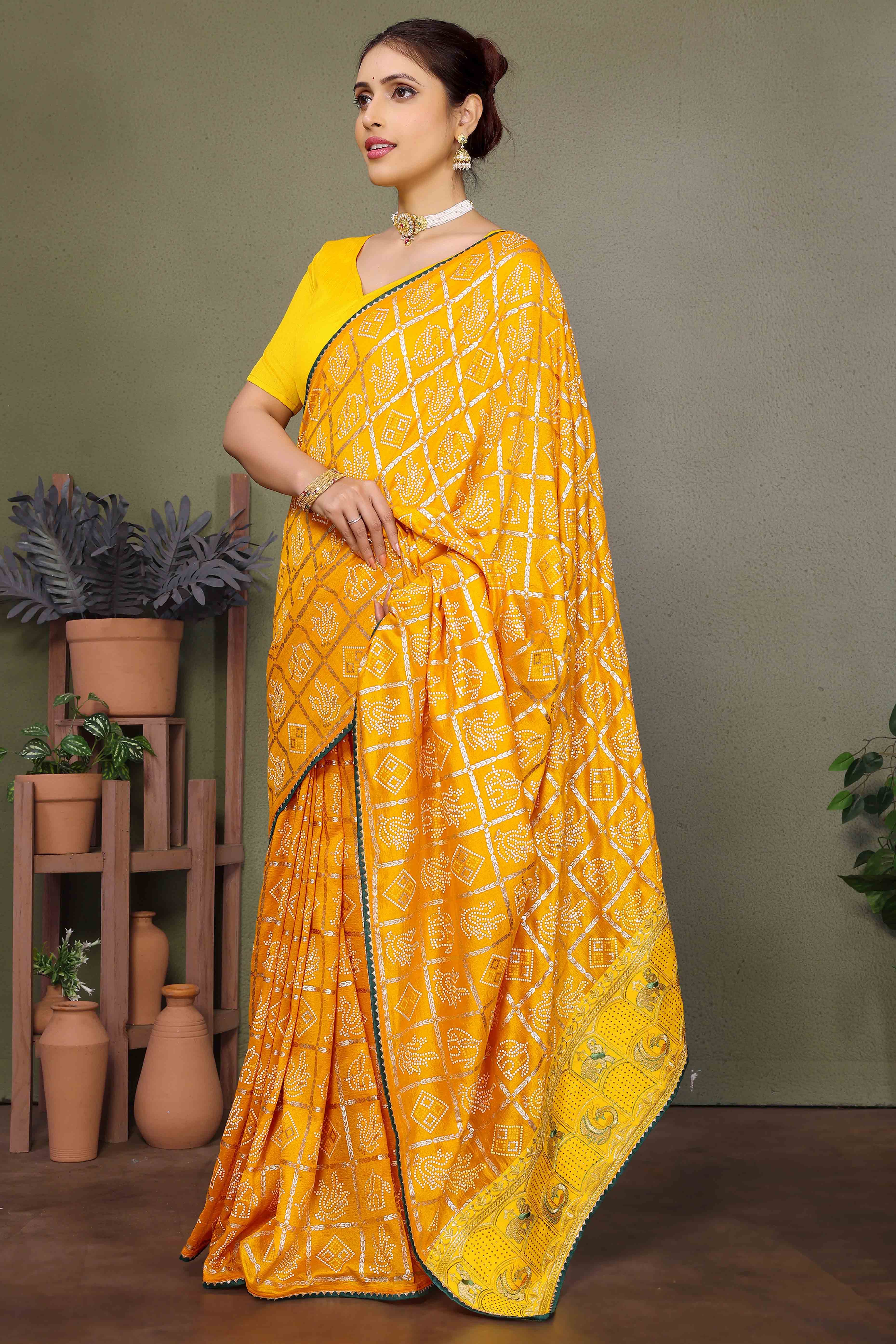 Yellow Vichitra Silk Saree Featuring Bandhani Patterns and Graceful Embroidered Borders