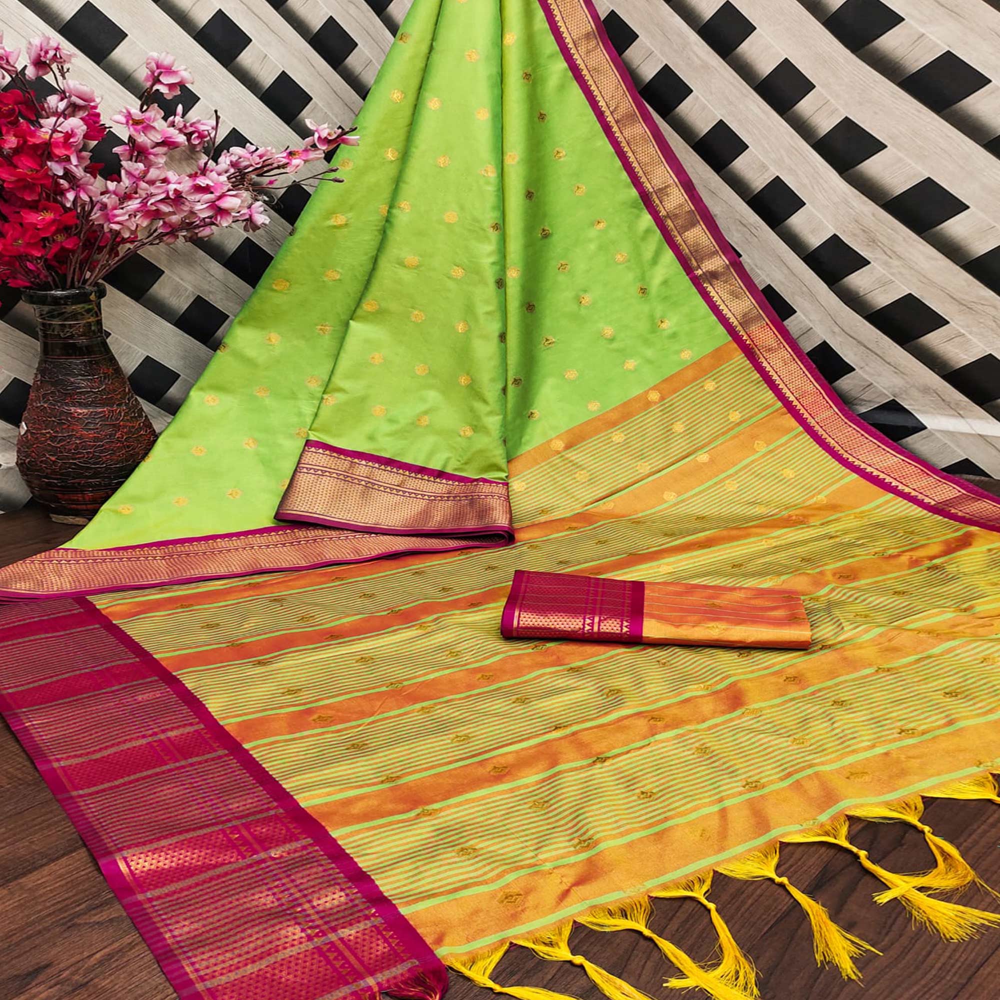 Green Zari Woven Lichi Art Silk Saree With Tassels