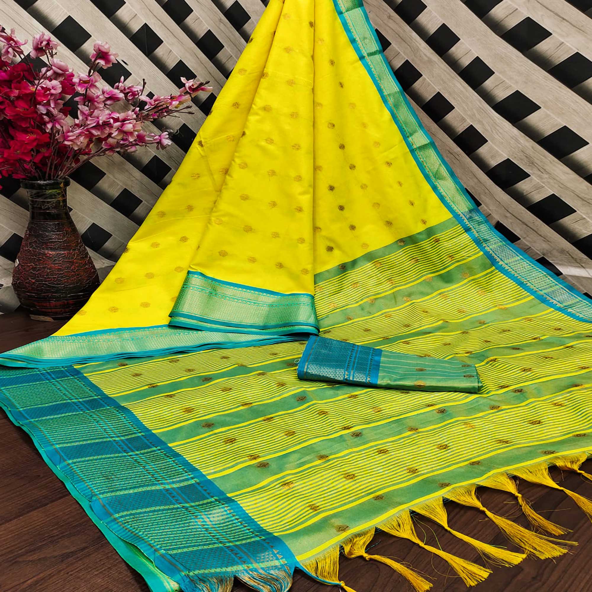 Lemon Yellow Zari Woven Lichi Art Silk Saree With Tassels