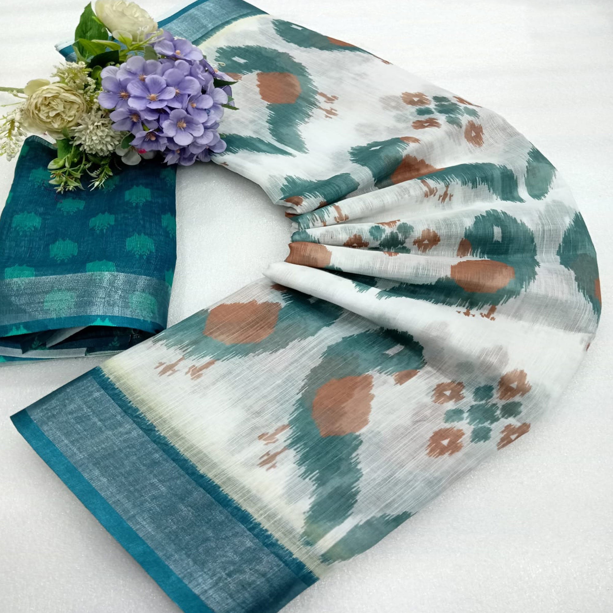 Teal Ikkat Printed Linen Saree