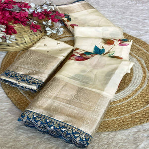Cream Floral Printed Dola Silk Saree Accentuated with a Traditional Woven Border