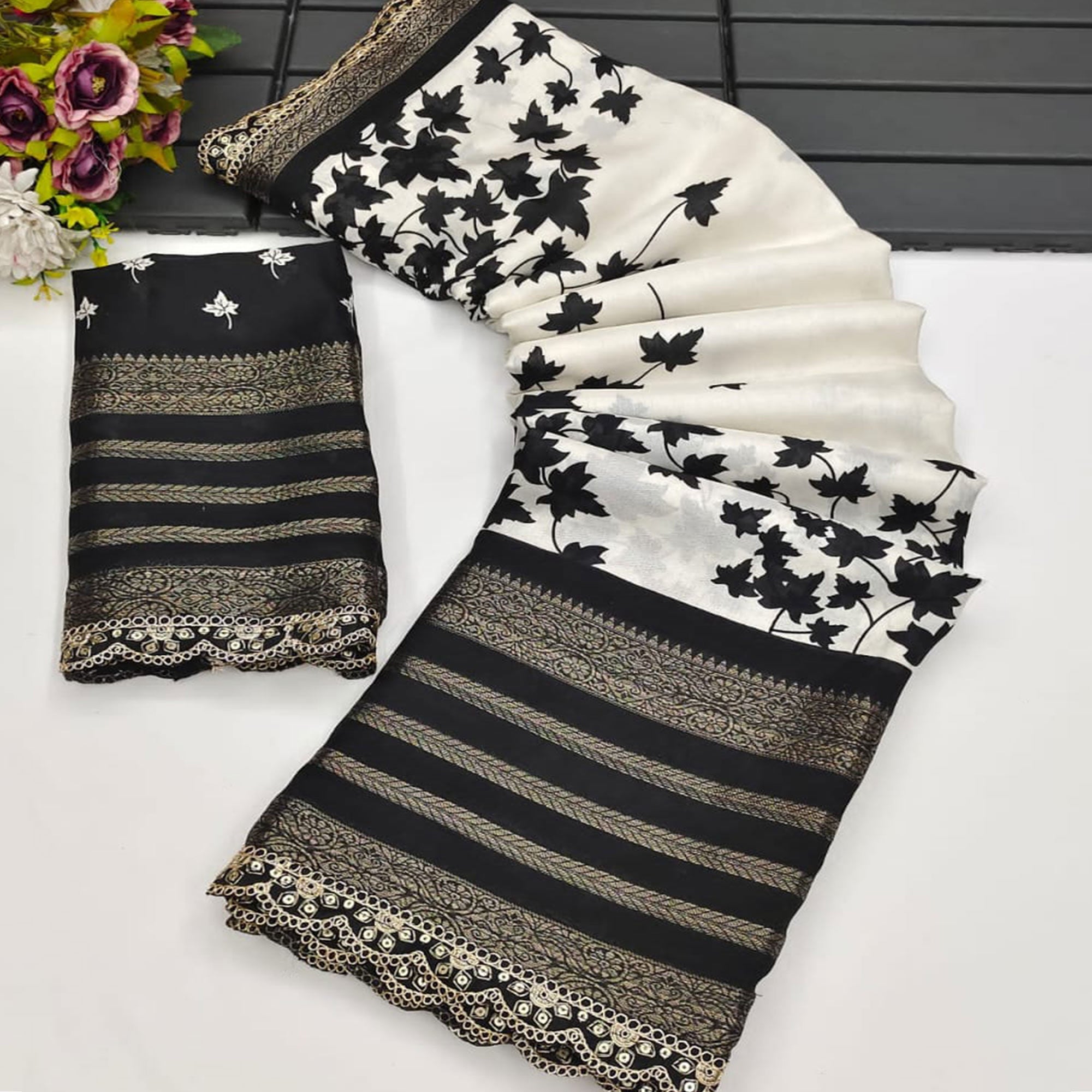 Off White & Black Floral Printed Dola Silk Saree With Zari Border