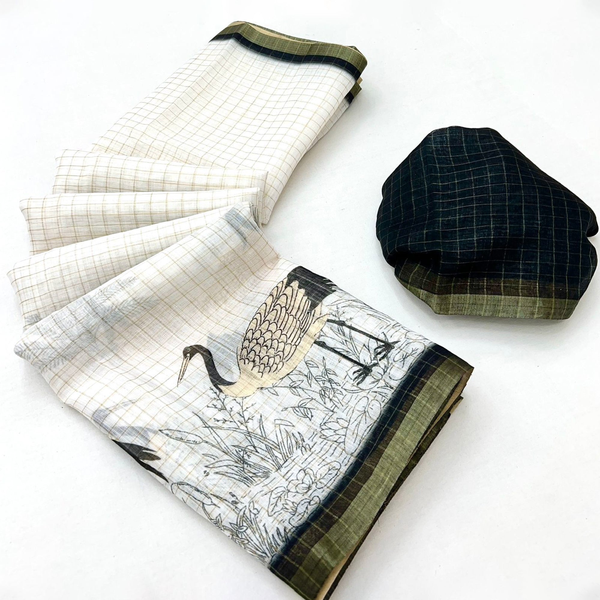 Off White and Black Checkered Printed Linen Saree with a Breezy Feel