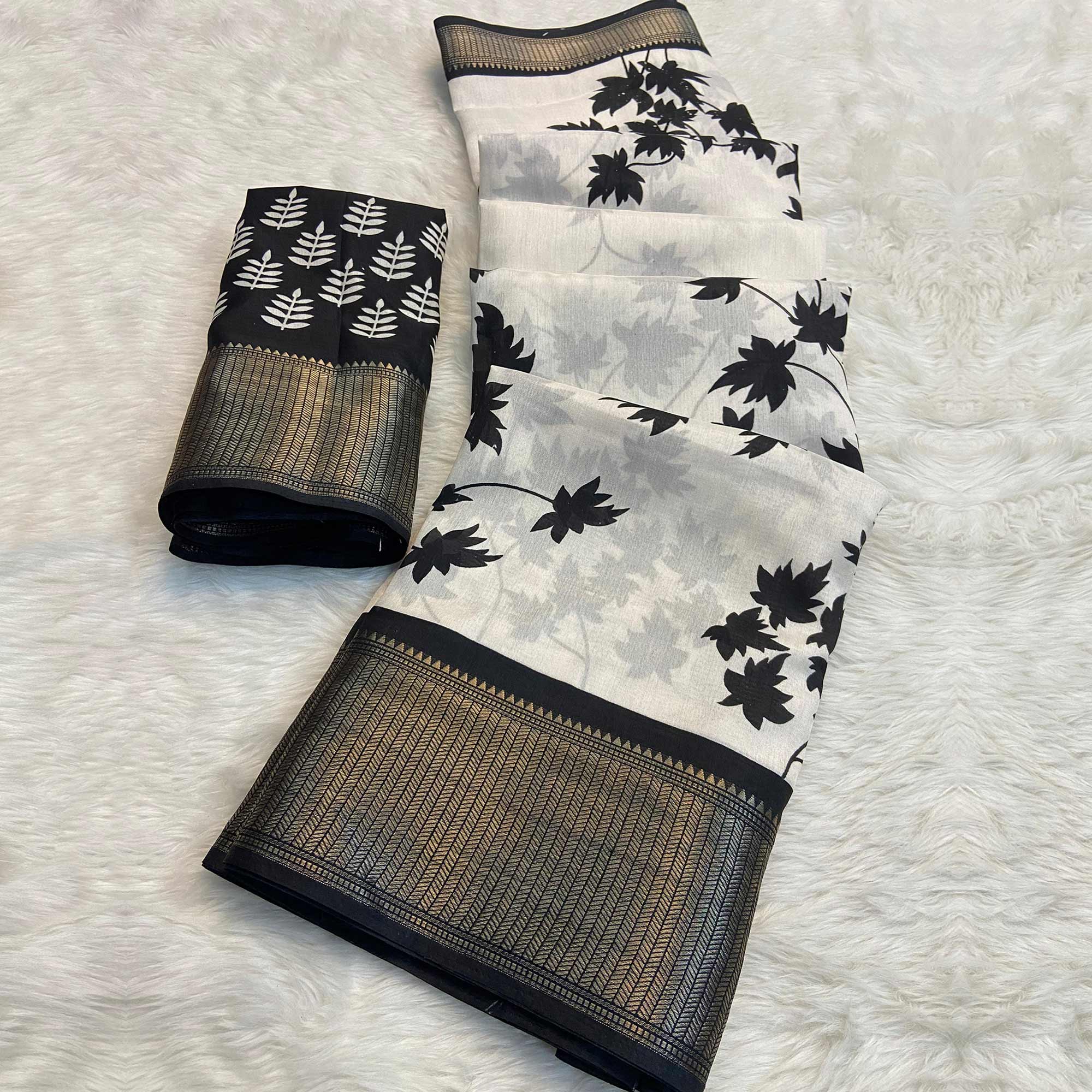 White & Black Floral Printed Dola Silk Saree With Woven Border