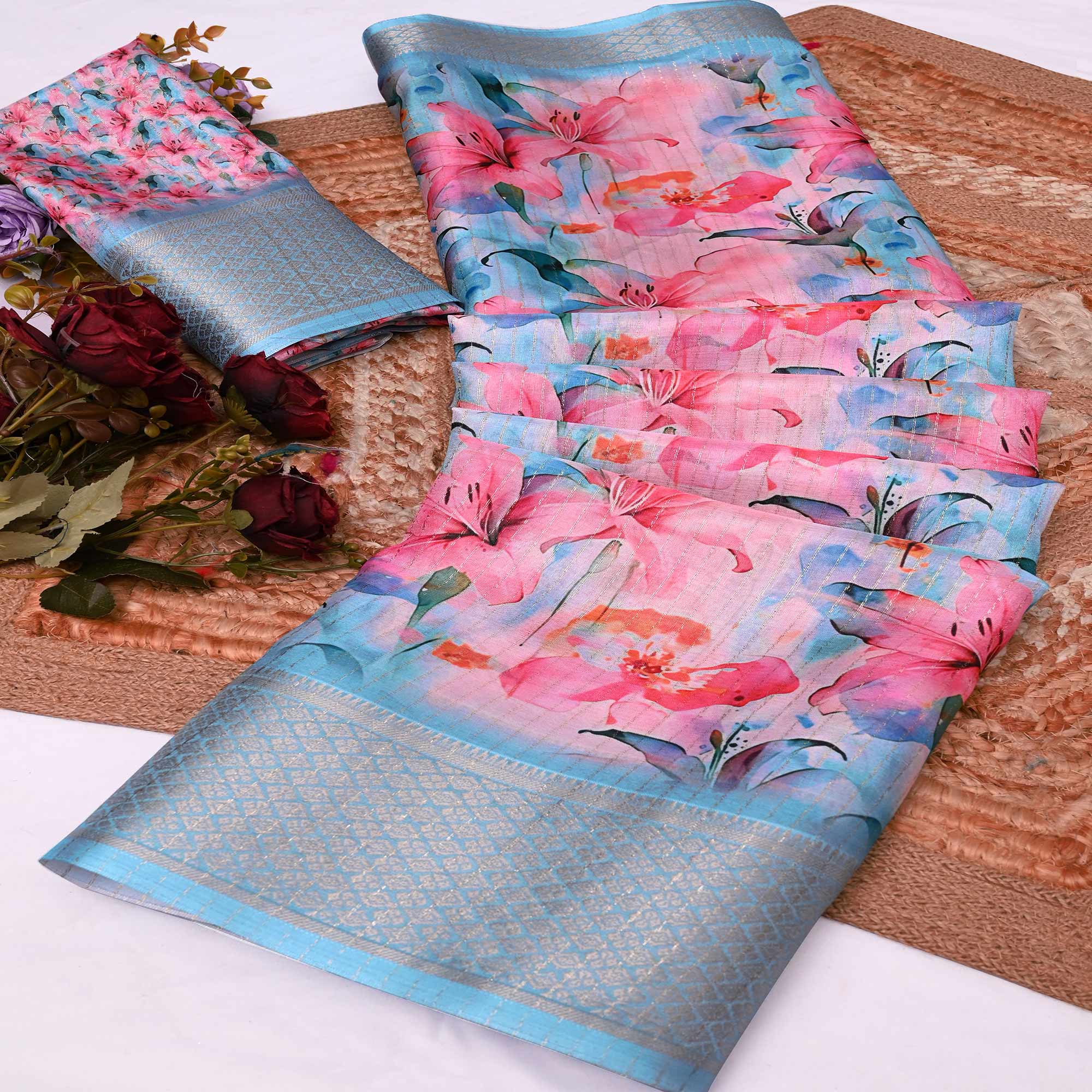 Pink & Blue Floral Printed Dola Silk Saree With Elegant Silver Zari & Intricate Weaving Border