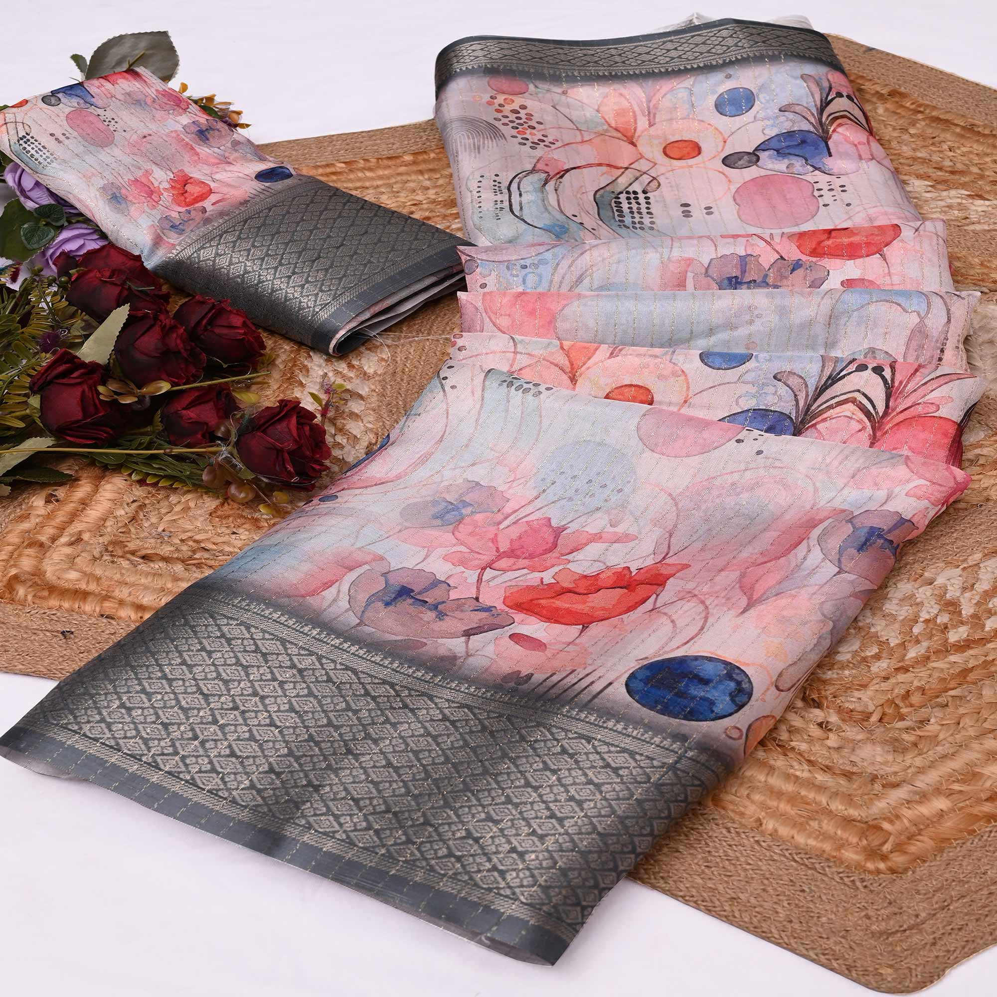 Pink & Grey Floral Printed Dola Silk Saree With Elegant Silver Zari & Intricate Weaving Border