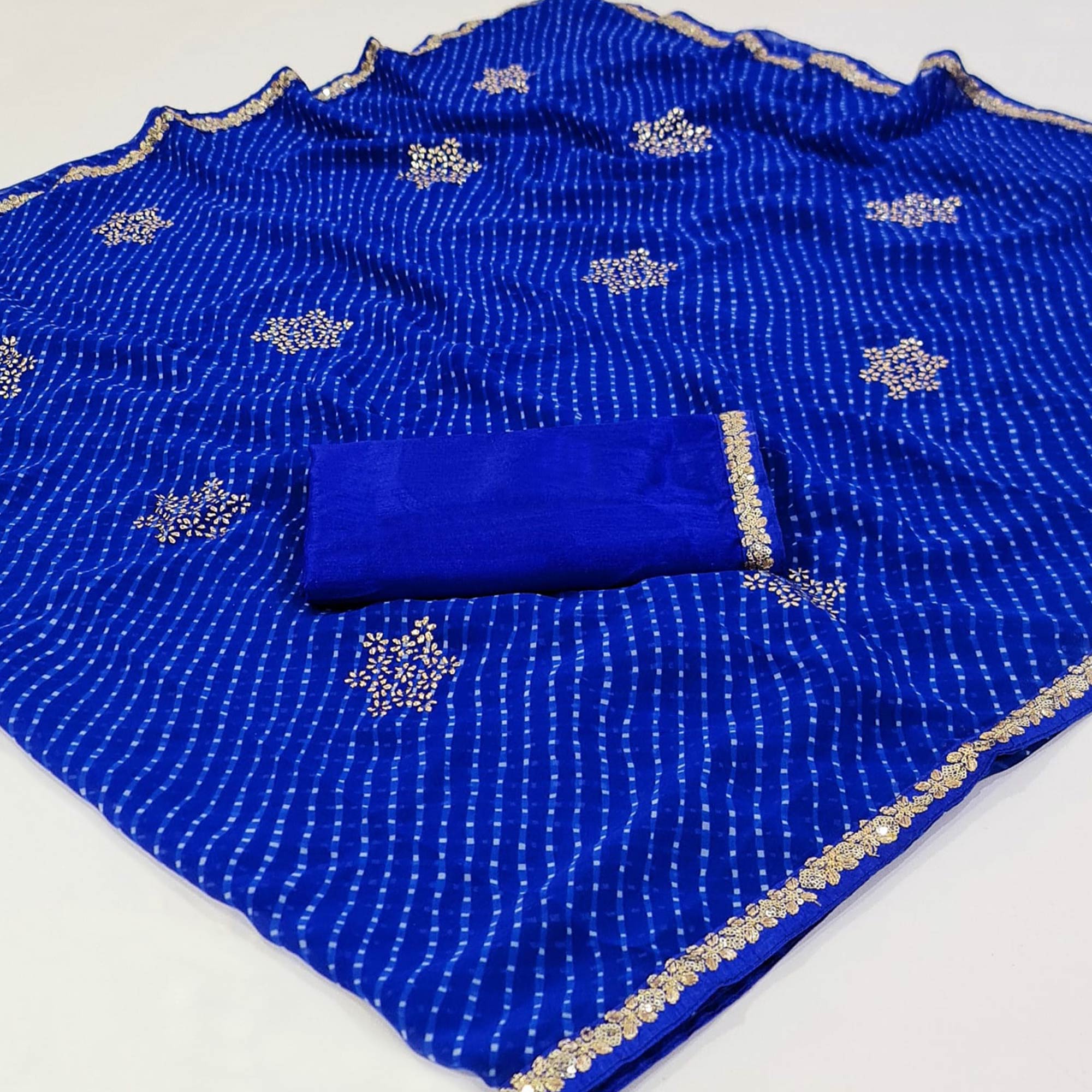 Blue Printed Georgette Saree With lace Border