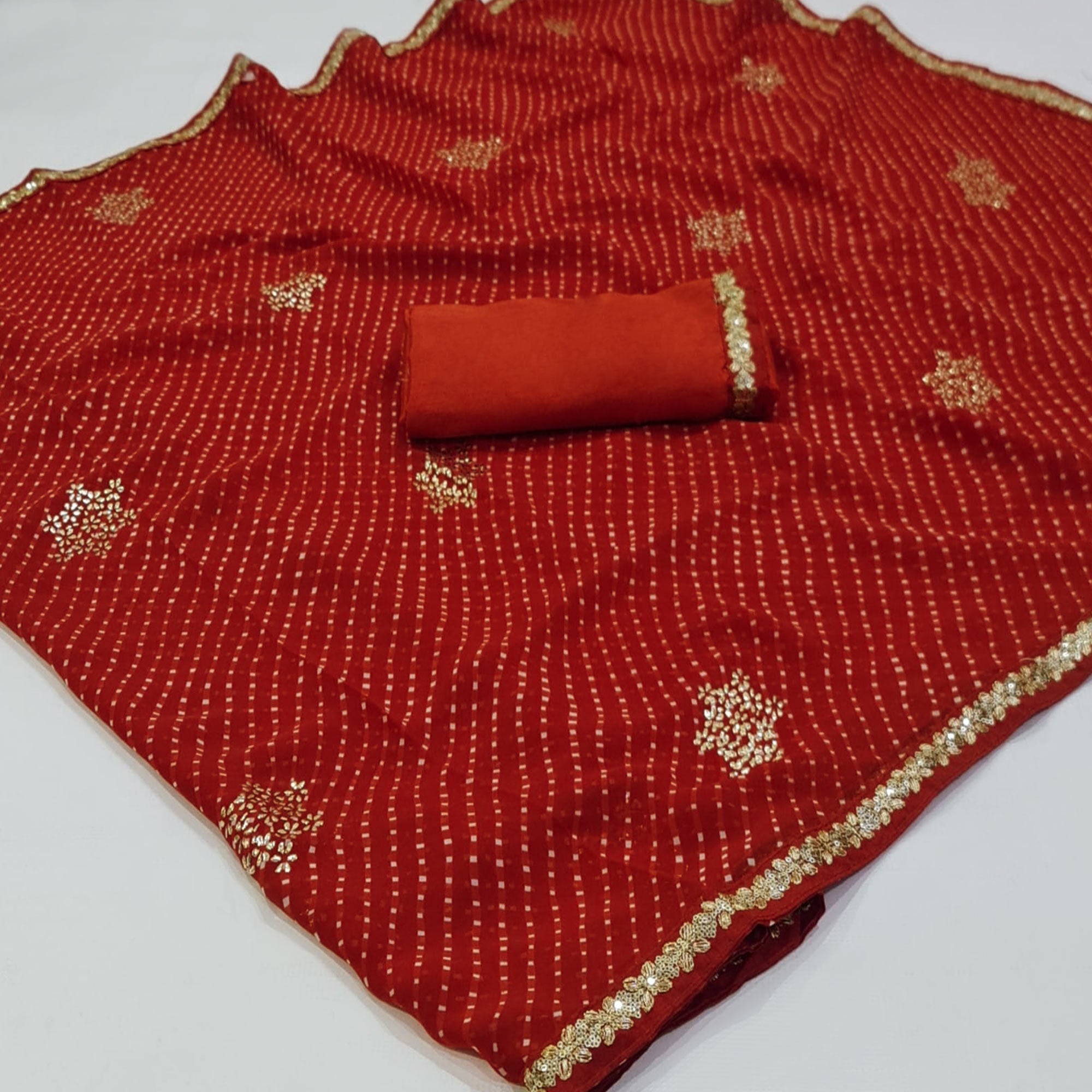 Red Printed Georgette Saree With lace Border