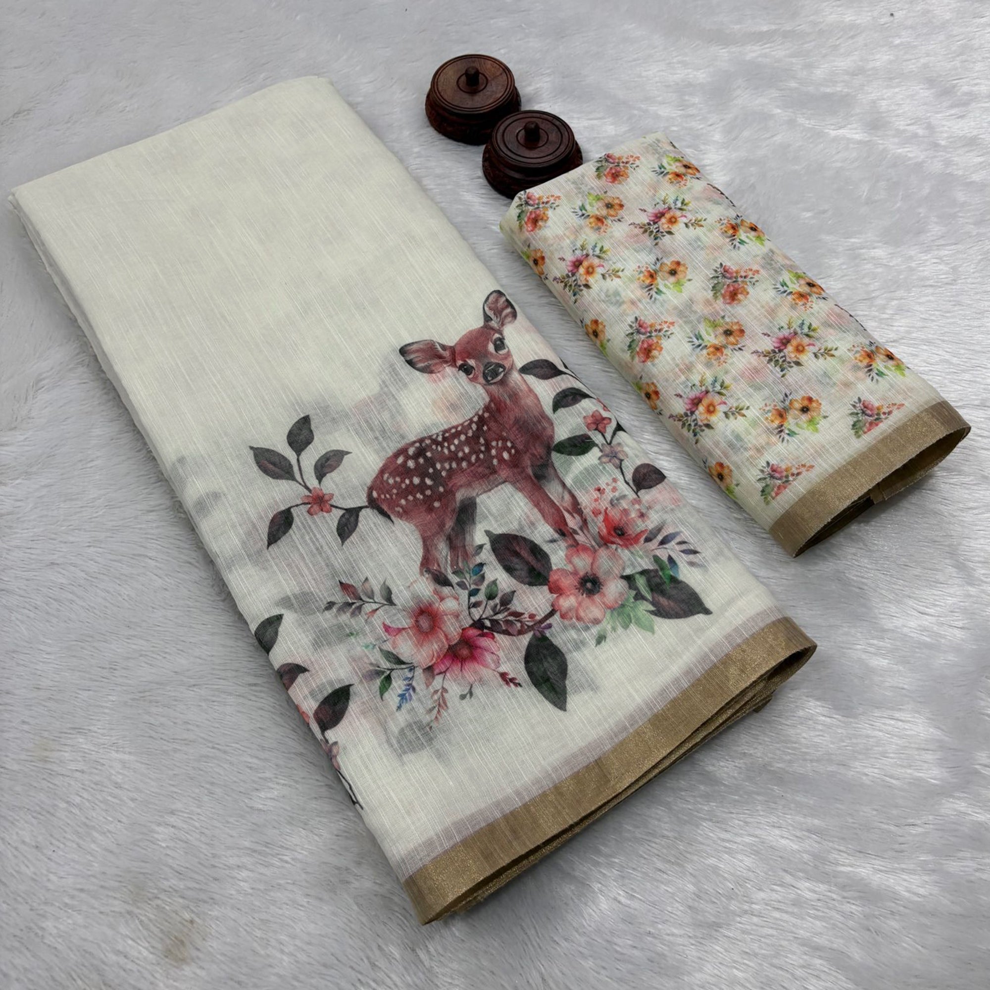 Off White Handprinted Linen Saree with Beautifully Woven Zari Edging