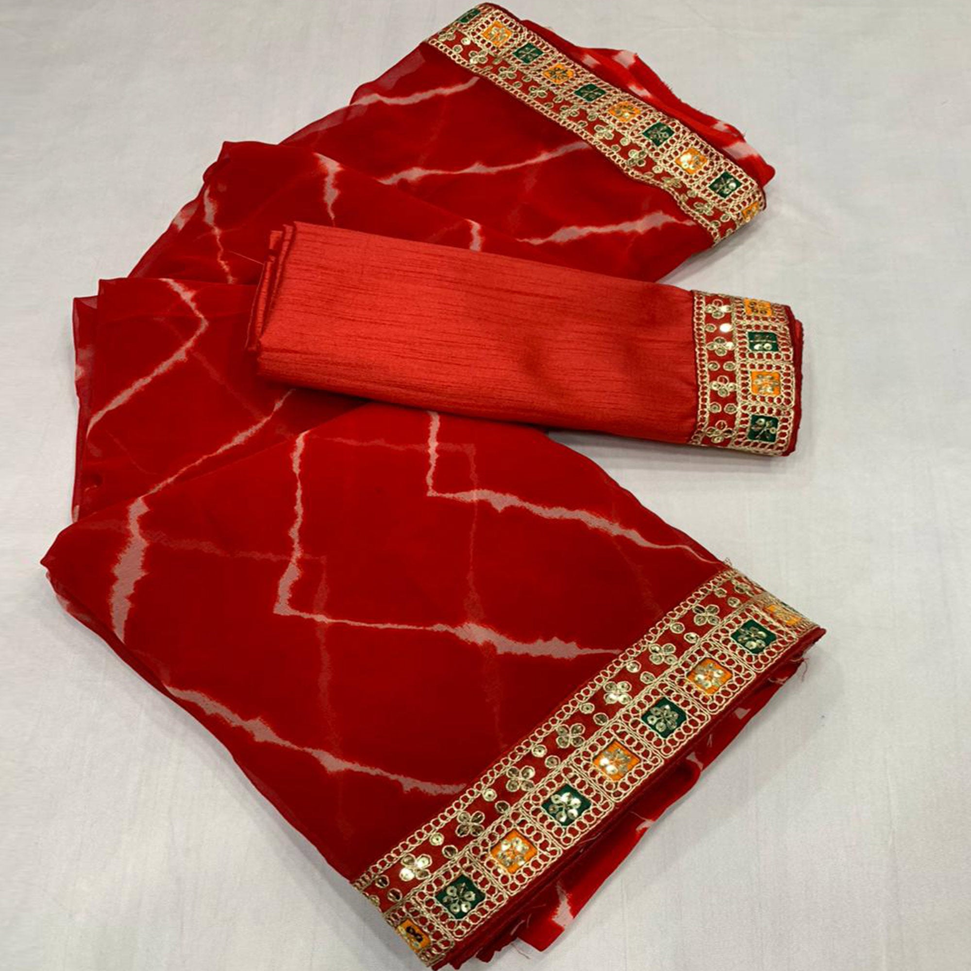 Red Leheriya Printed Georgette Saree With Sequins Border