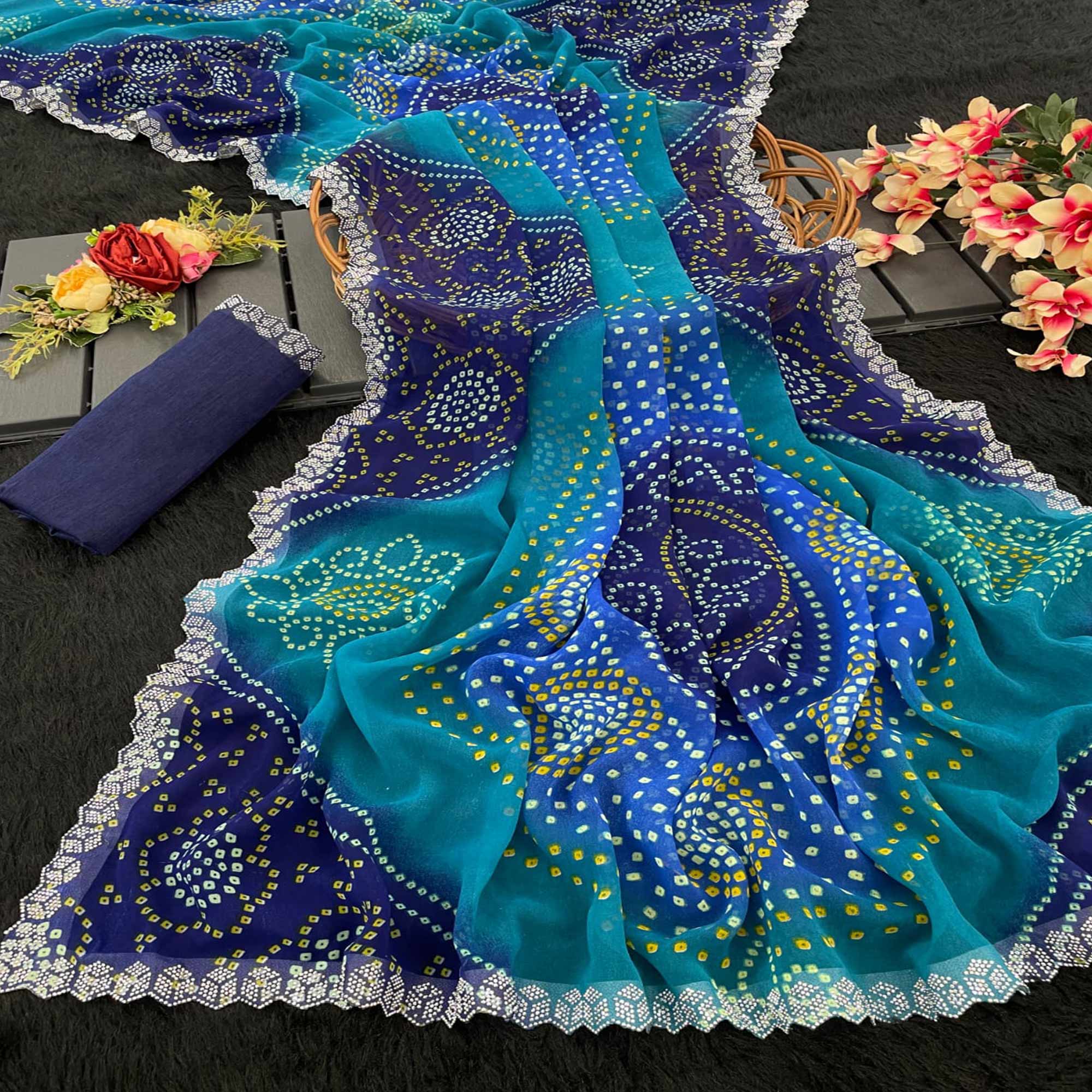 Blue Georgette Saree With Traditional Bandhani Print And Sparkling Stone Work Border