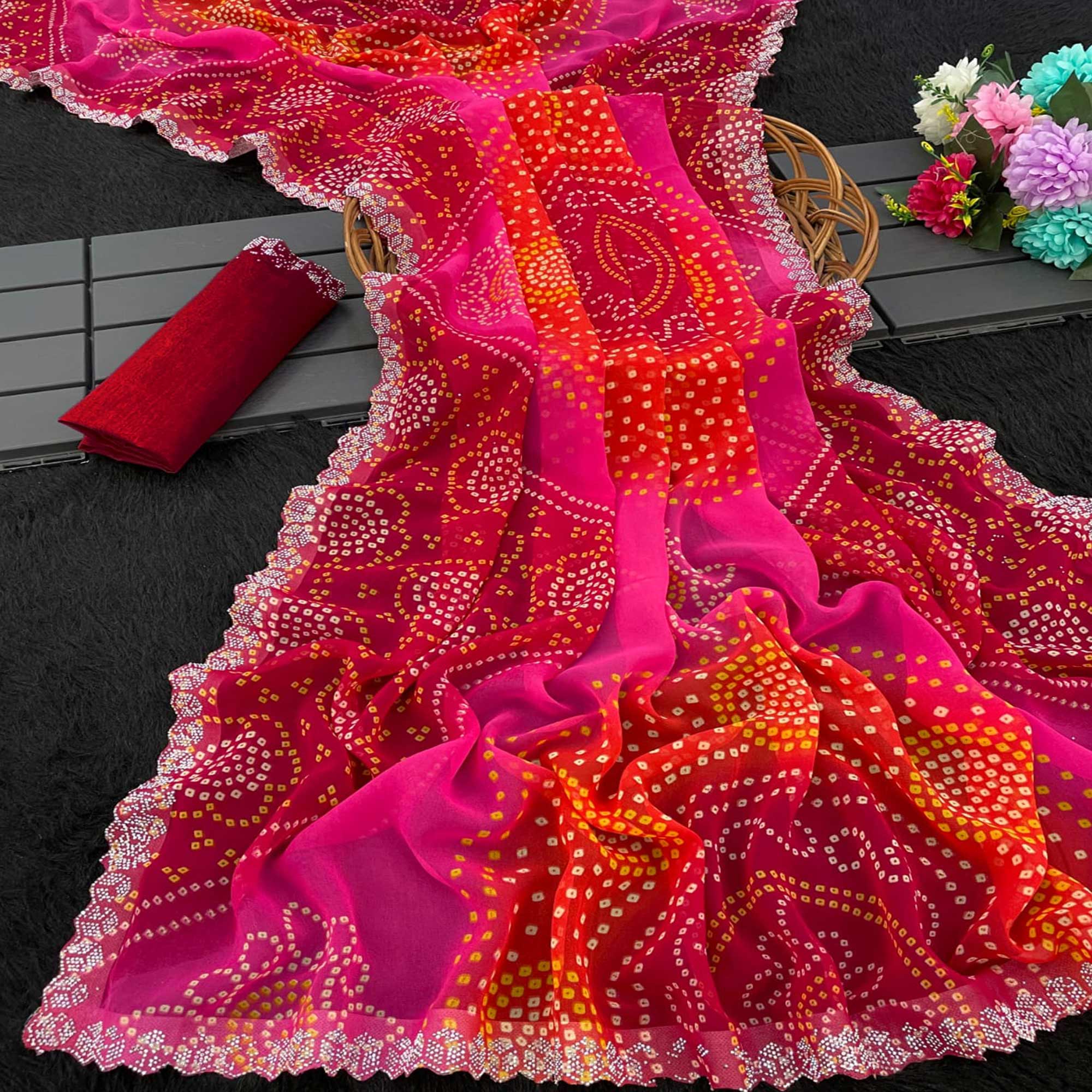 Red & Pink Georgette Saree With Traditional Bandhani Print And Sparkling Stone Work Border