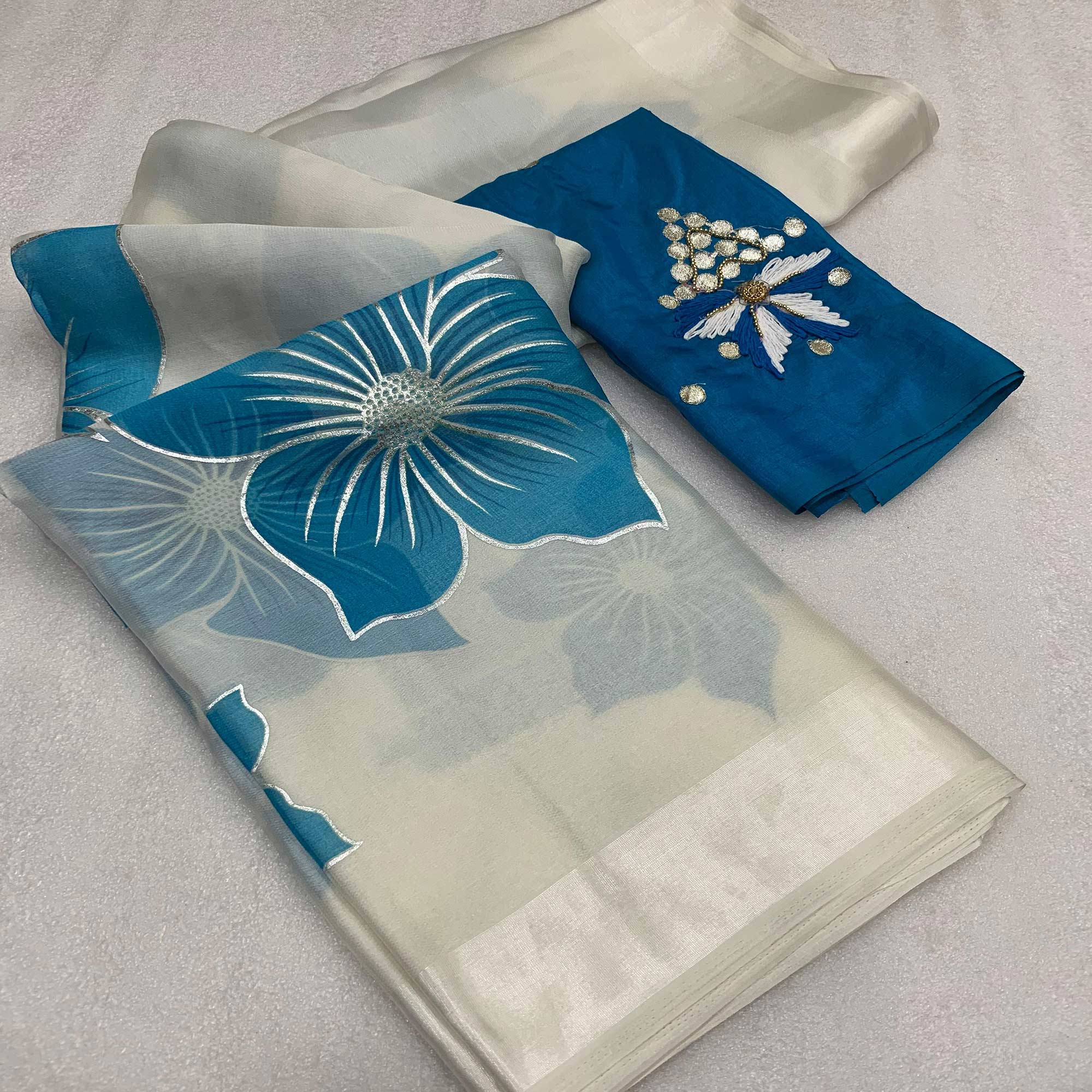 White & Sky Blue Floral Foil Printed Organza Saree