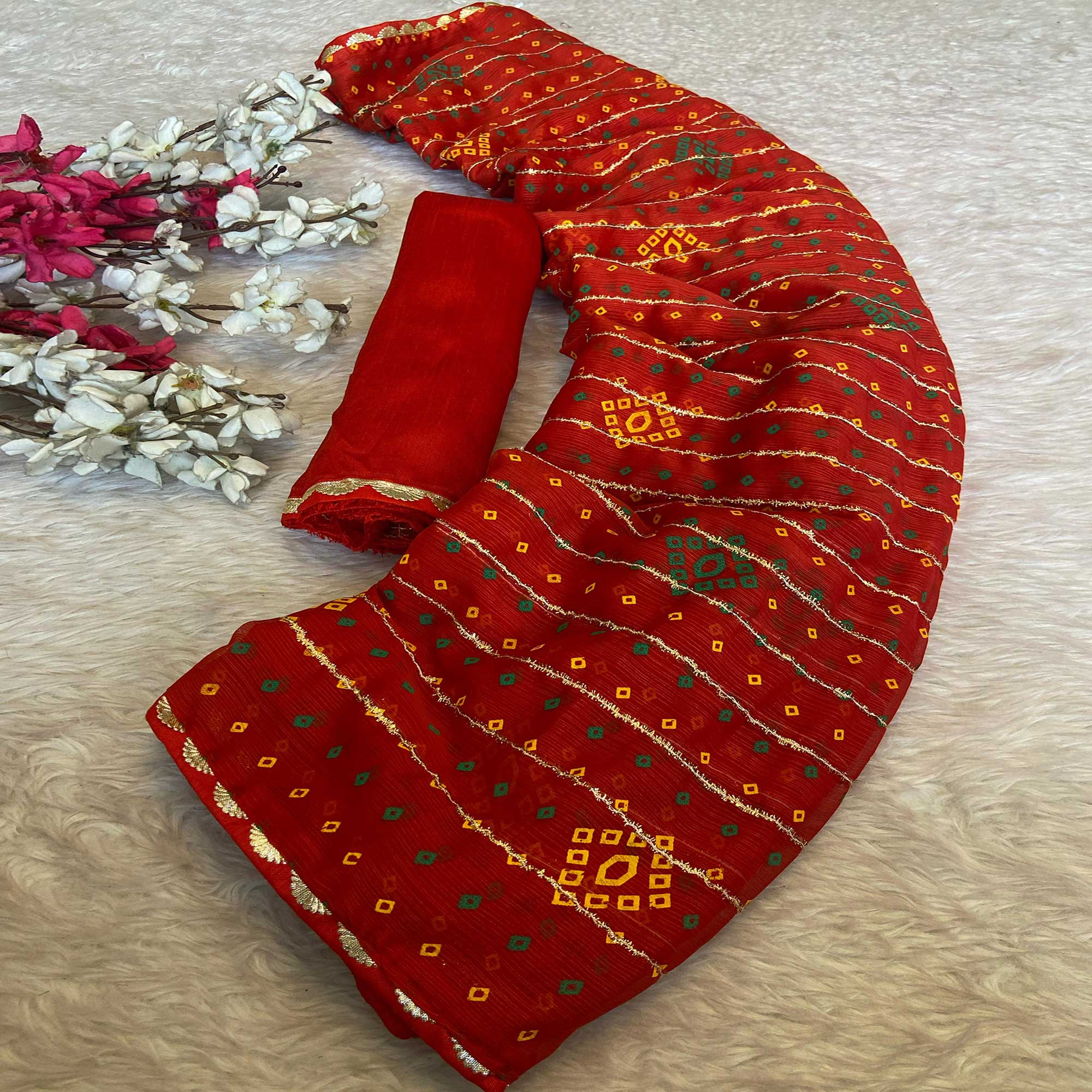 Red Bandhani Printed Chiffon Saree with Graceful Touches of Zari Work