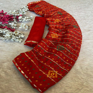 Red Bandhani Printed Chiffon Saree with Graceful Touches of Zari Work