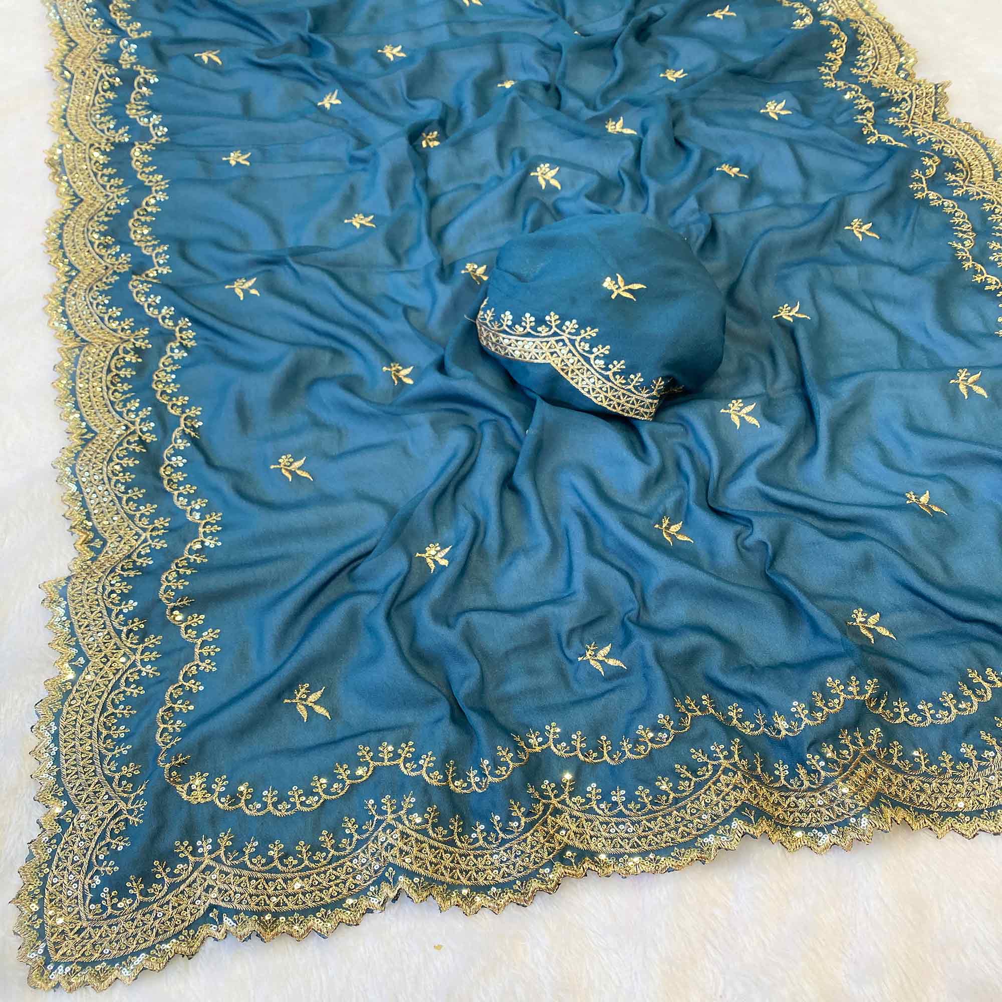 Teal Embroidered Star Georgette Saree Designed for Stylish Party Wear