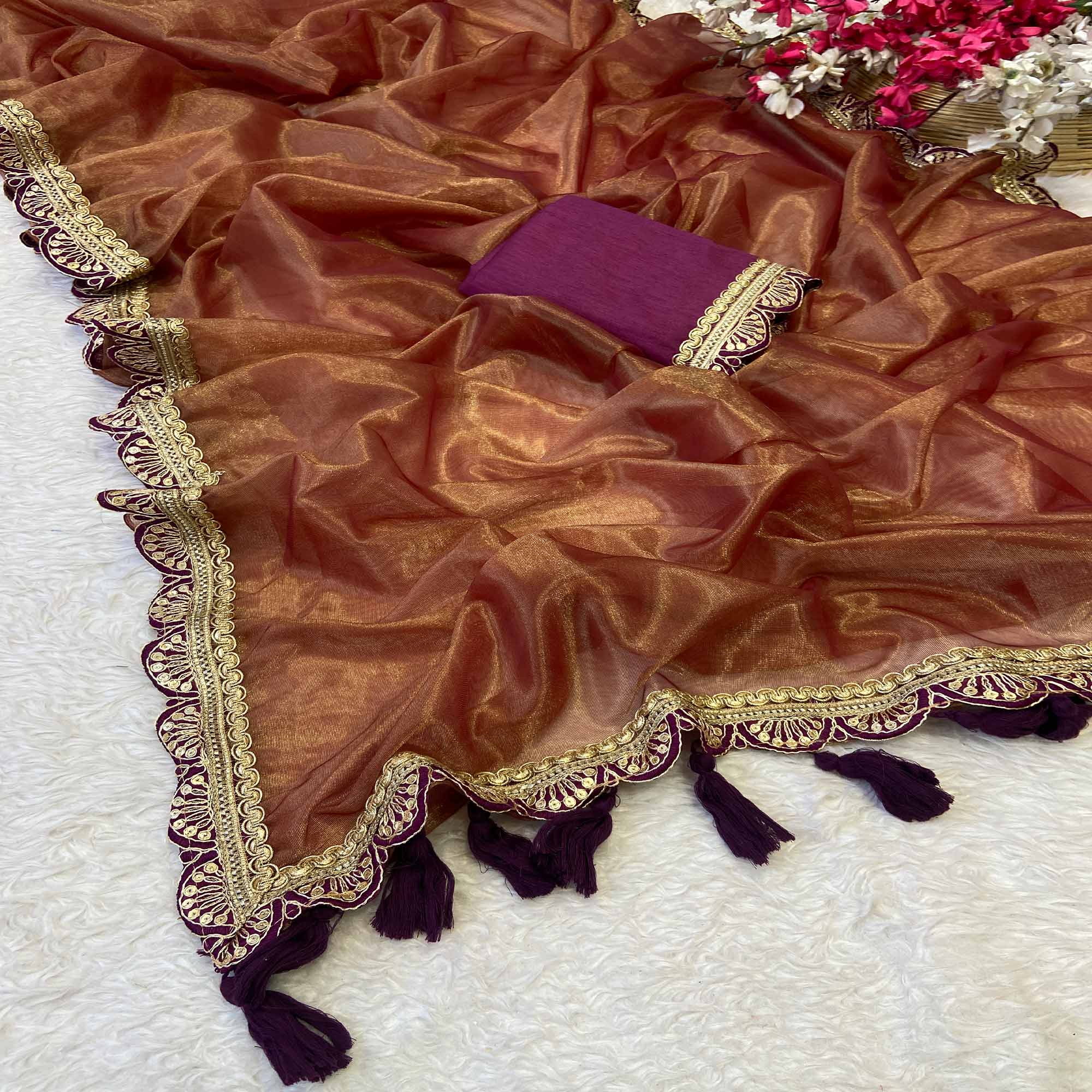 Orange Net Saree With Intricate Sequin Embroidery & Tassel Embellished Pallu