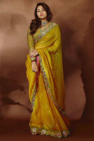 Embroidered Mustard Georgette Saree with Shimmering Mirror Accents