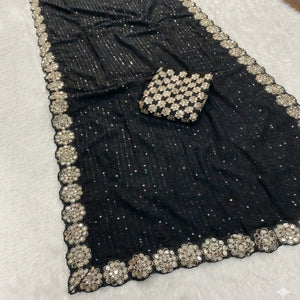 Stunning Black Georgette Party Wear Saree Adorned with Heavy Sequins Embellishment