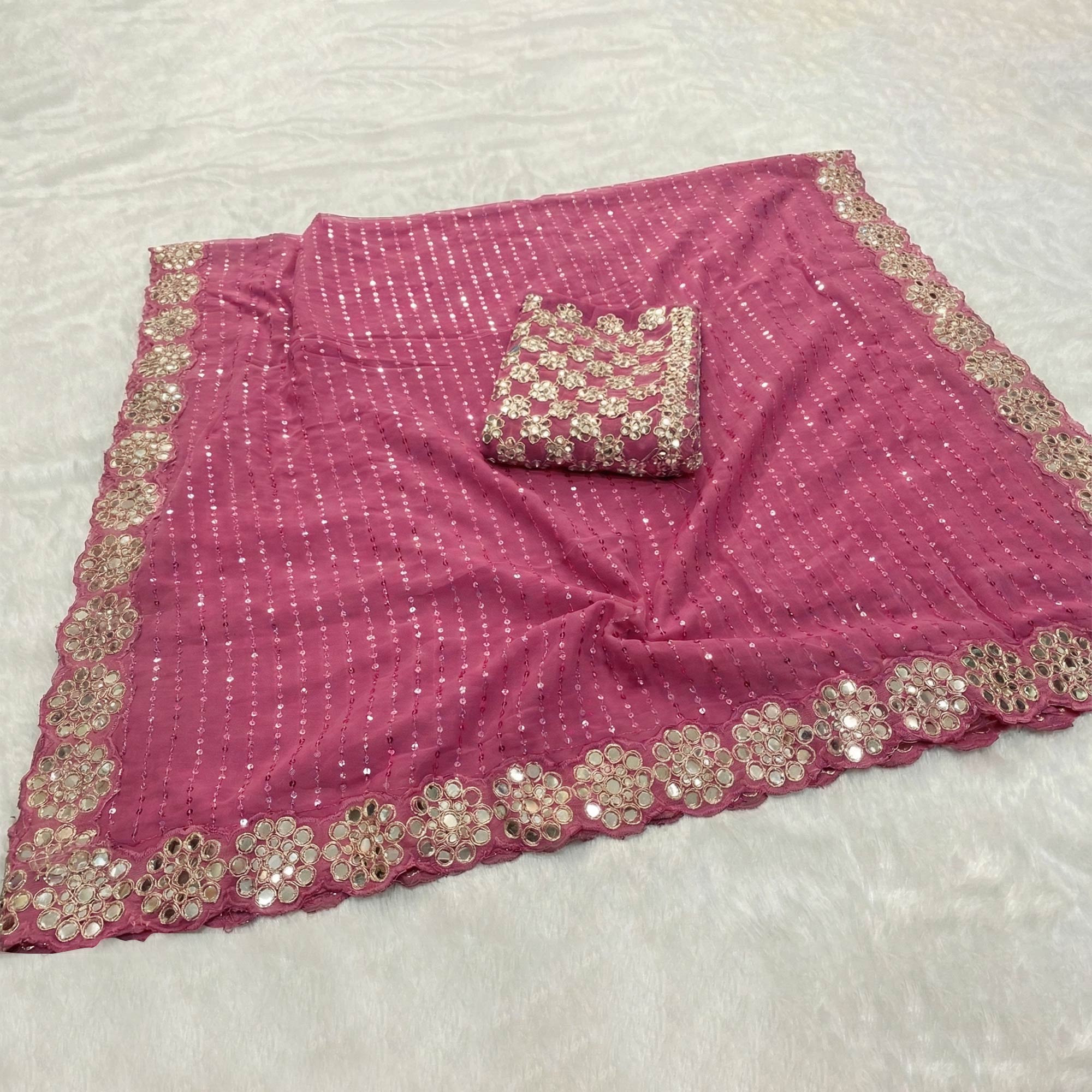 Stunning Pink Georgette Party Wear Saree Adorned with Heavy Sequins Embellishment