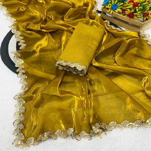 Gold Tissue Saree Featuring Solid Finish and Delicate Lace Work by Jimmy Choo Style