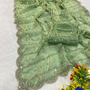 Green Designer Satin Partywear Saree Enhanced with Sparkling Sequins Work