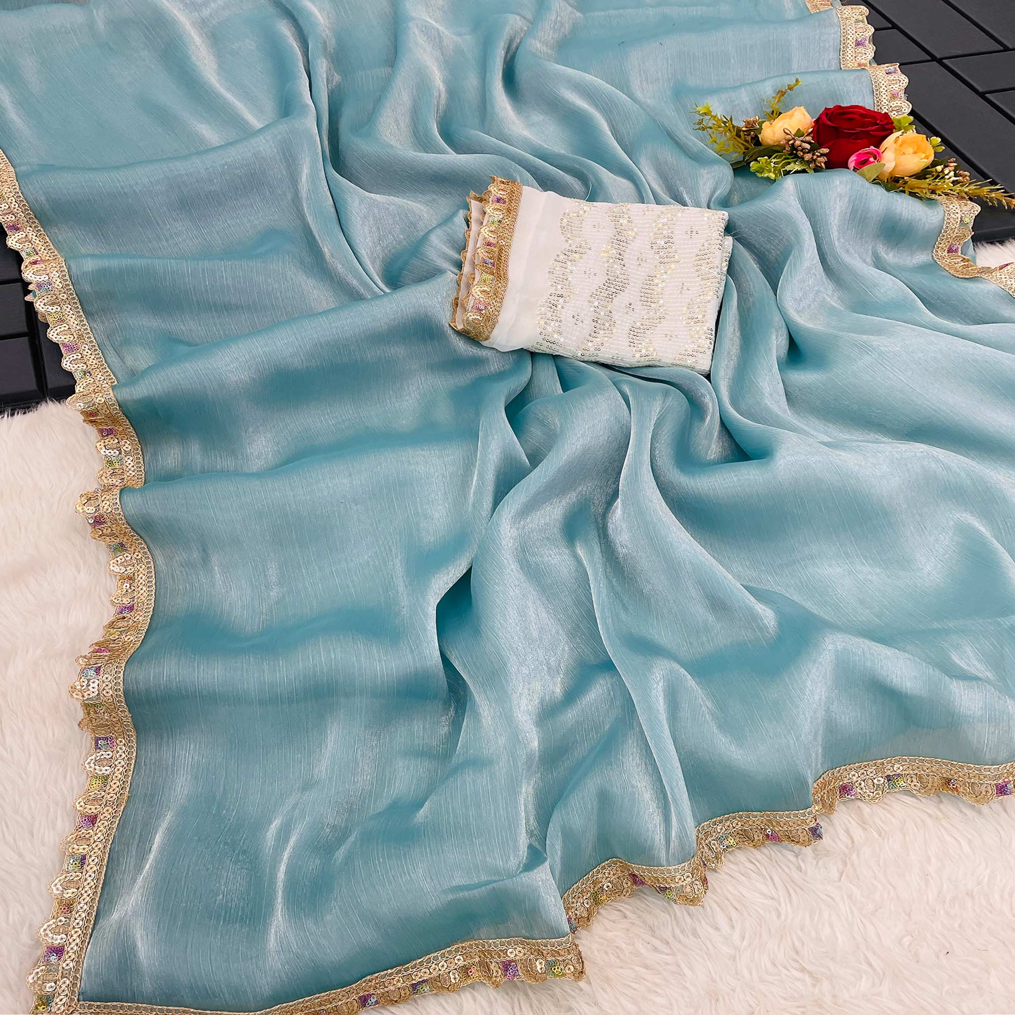 Turquoise Solid Satin Burberry Saree With Sparkling Sequins Embroidered Lace Border