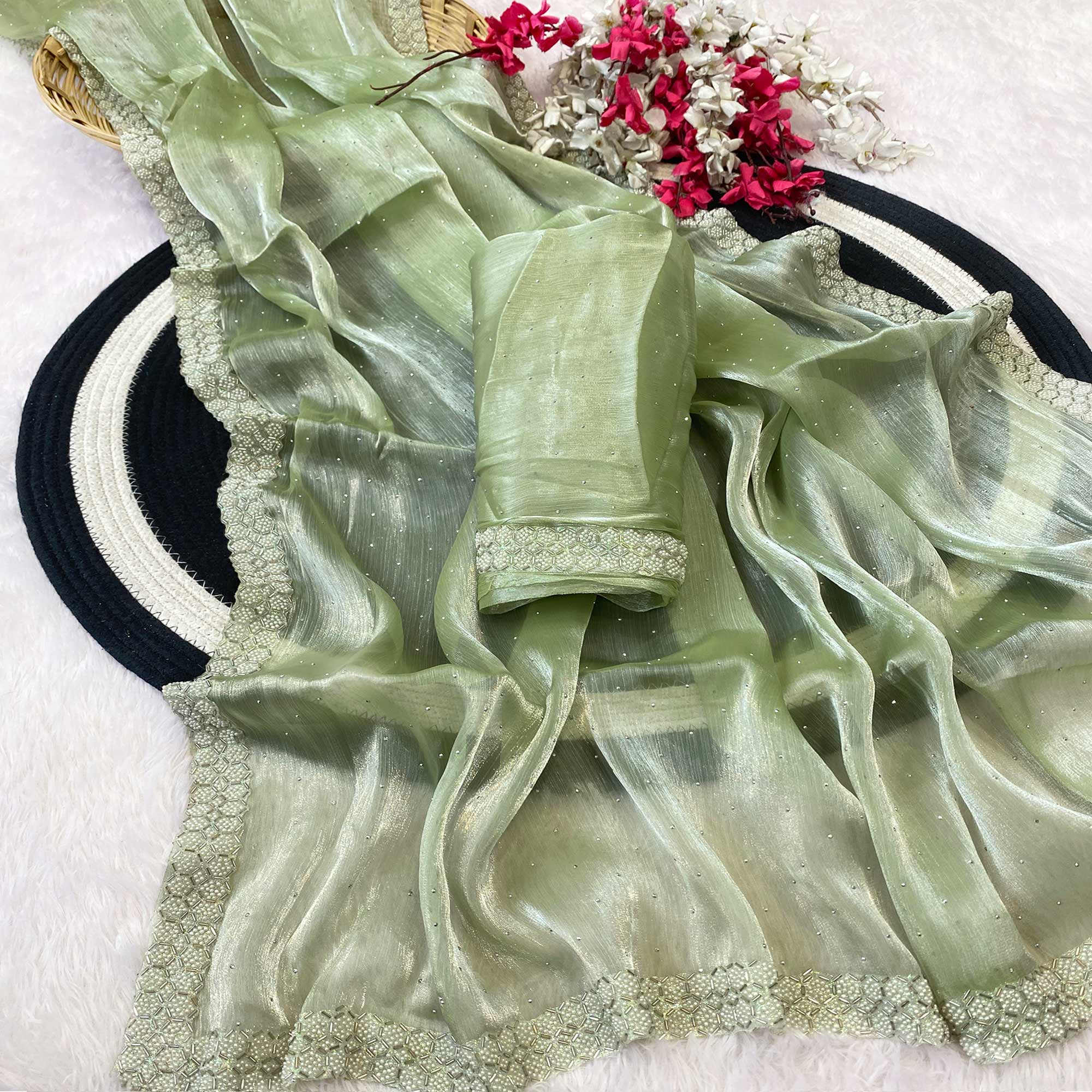 Pista Green Satin Burberry Saree Adorned With Sparkling Swarovski & Elegant Moti Work Border