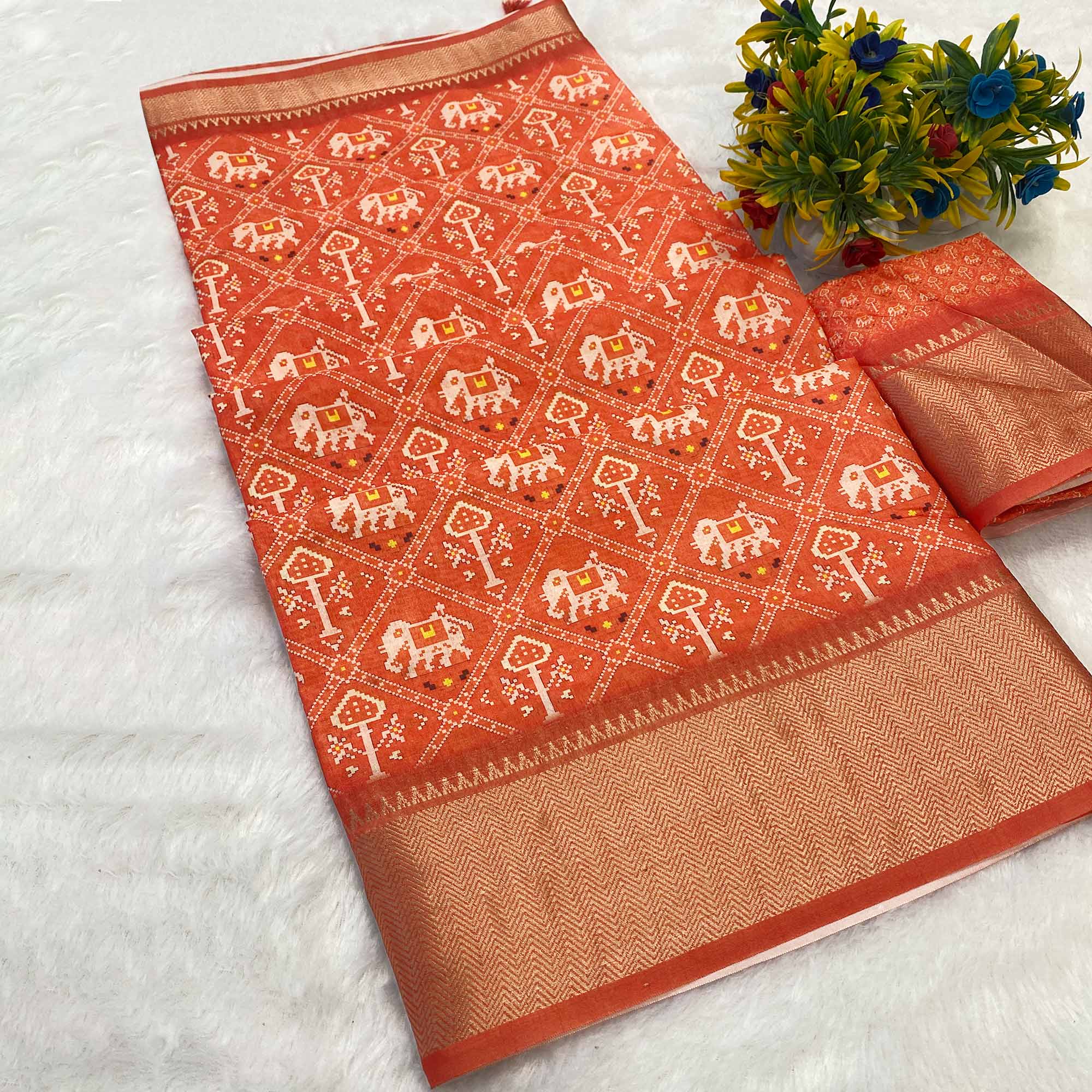 Orange Dola Silk Saree Featuring Traditional Patan Patola Print