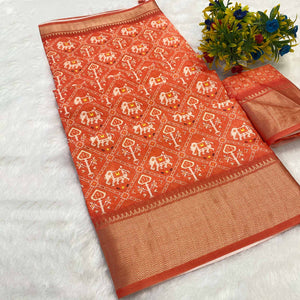 Orange Dola Silk Saree Featuring Traditional Patan Patola Print