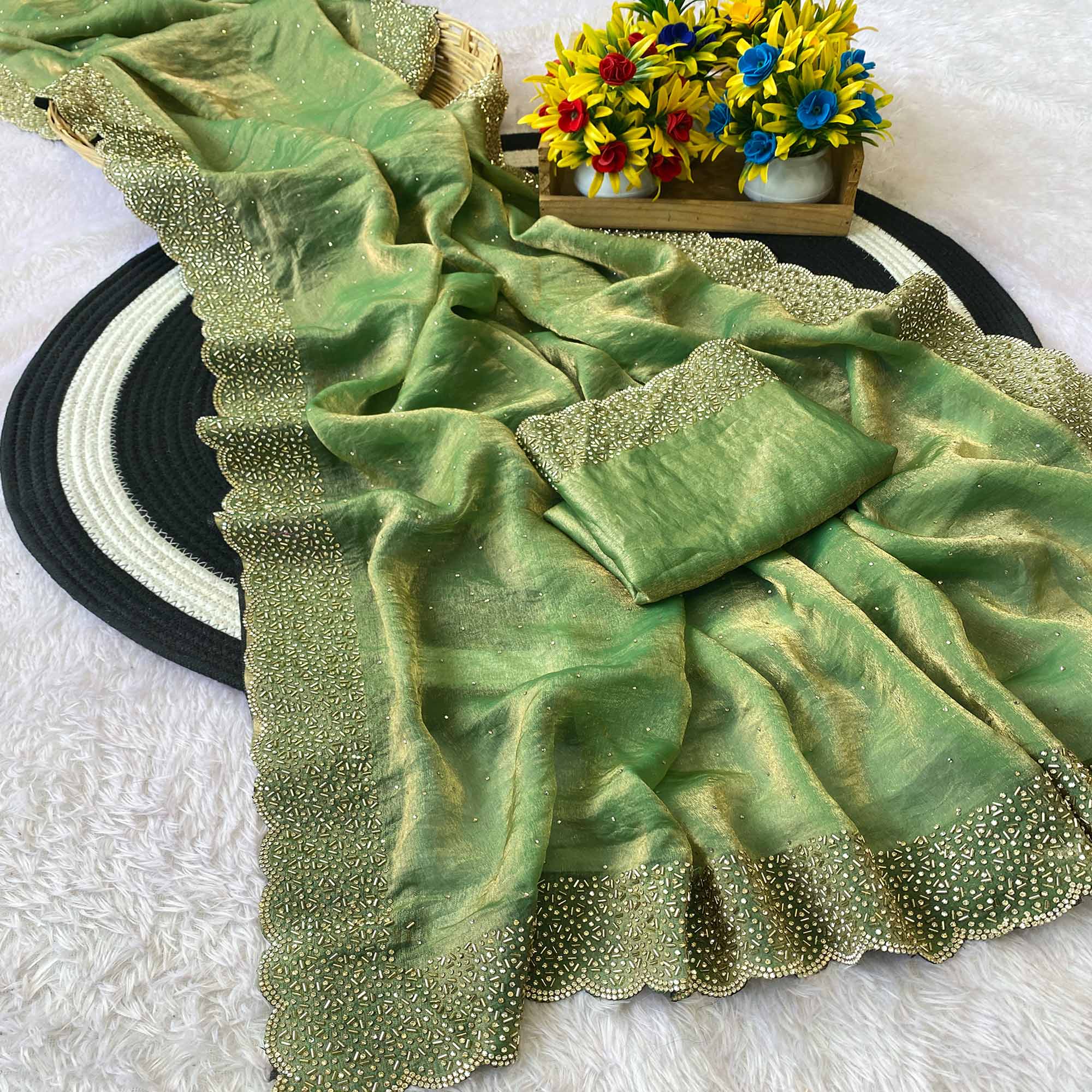 Green Fandy Satin Saree Featuring Intricate Swarovski Work & Decorative Zarkan Border