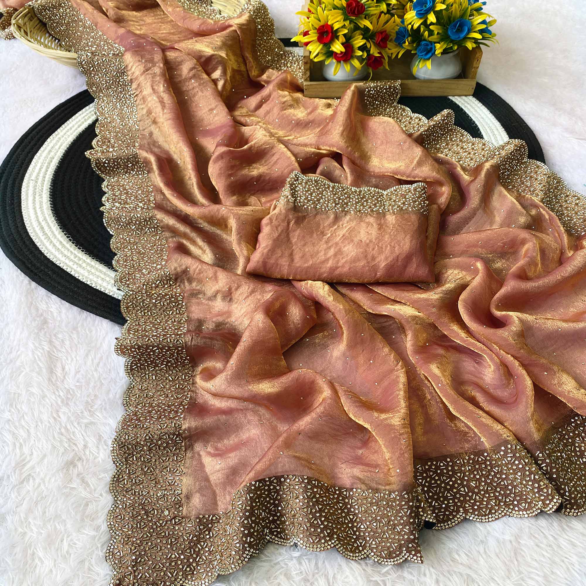 Peach Fandy Satin Saree Featuring Intricate Swarovski Work & Decorative Zarkan Border