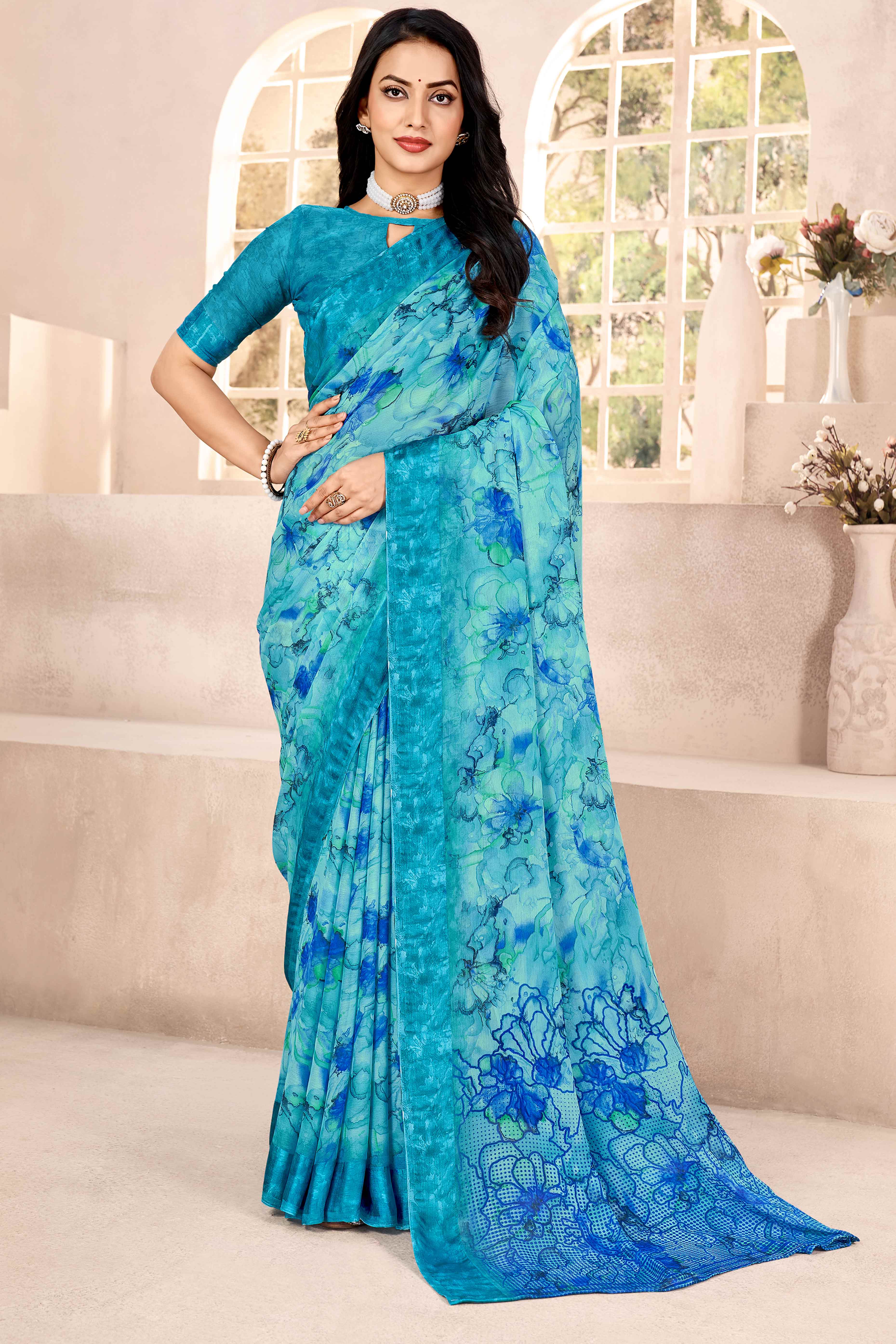 Blue Chiffon Saree With Delicate Floral Prints & Elegant Woven Border