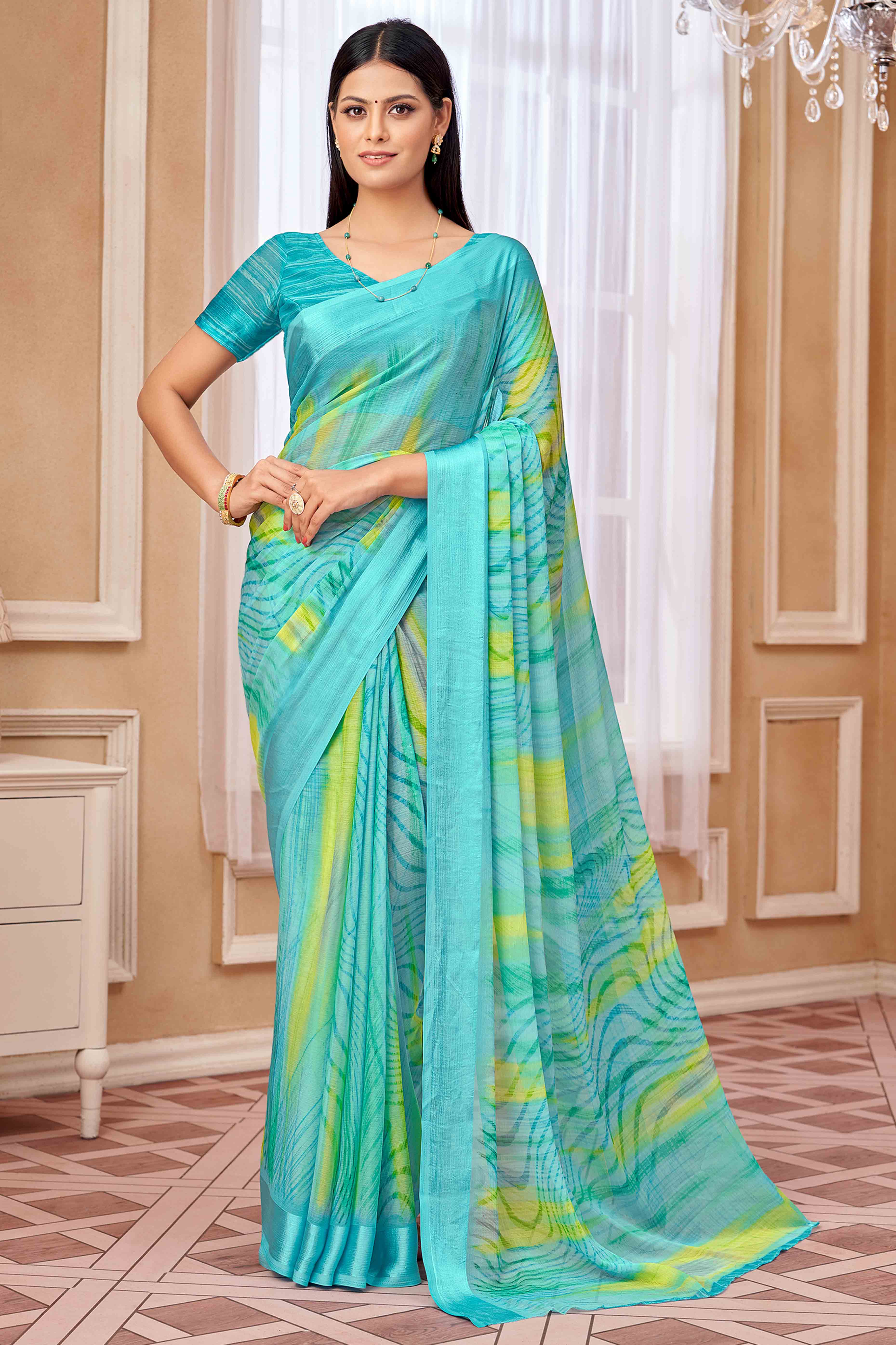 Turquoise Chiffon Saree With Delicate Prints & Elegant Satin Woven Border