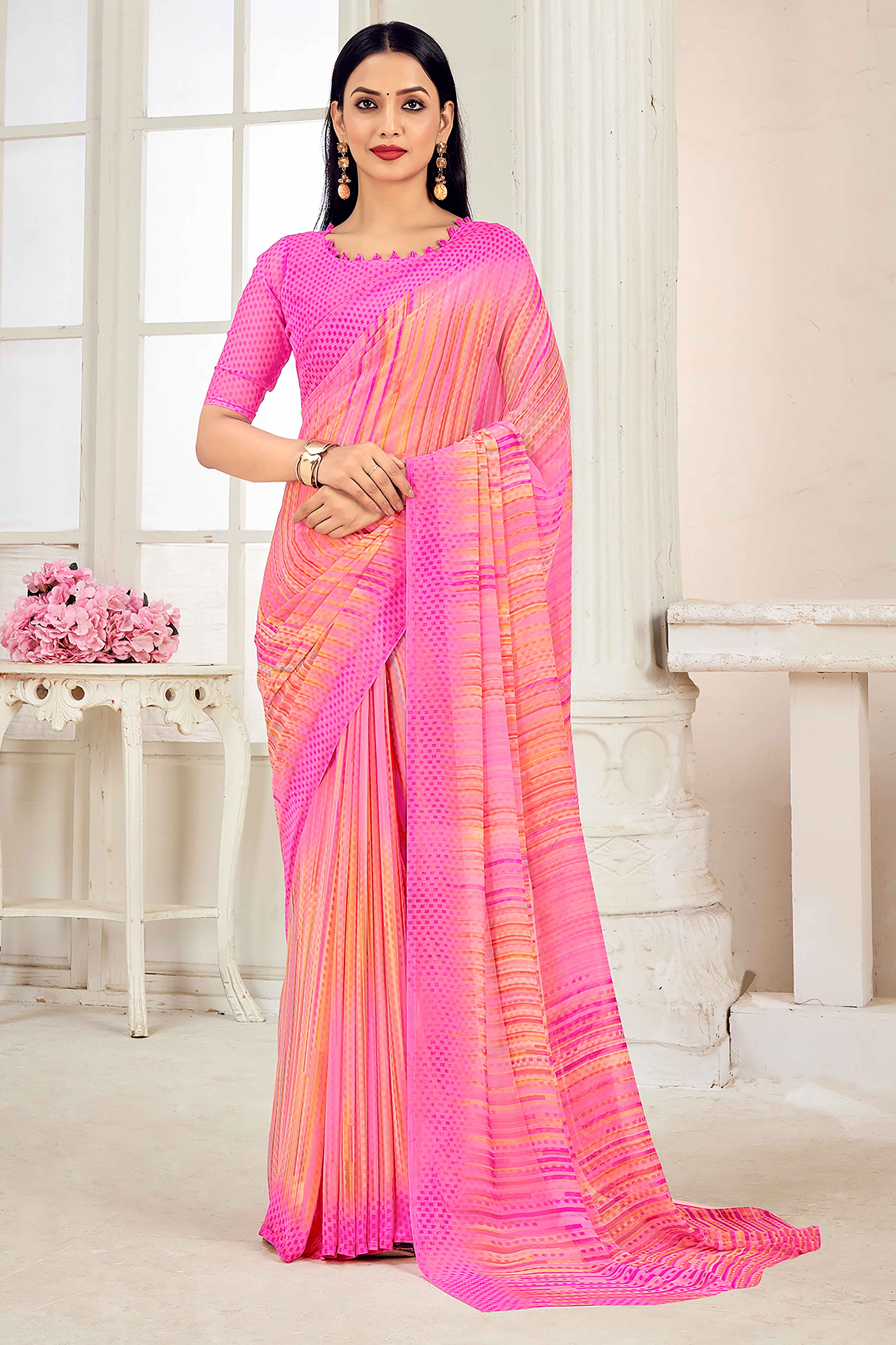 Pink Georgette Saree With Elegant Striped Print.