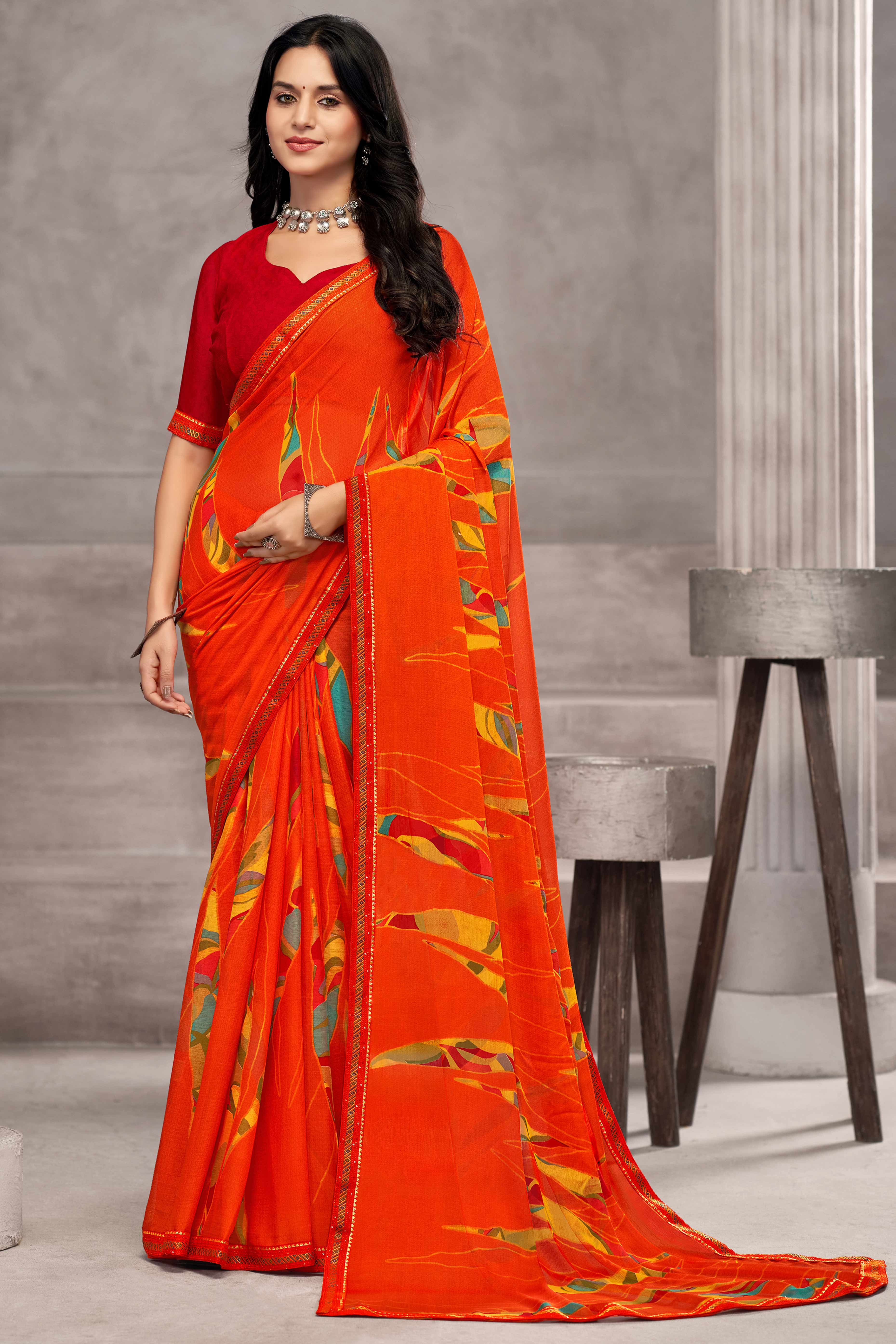 Refreshing Orange Chiffon Saree Featuring Digital Print & Graceful Lace Border