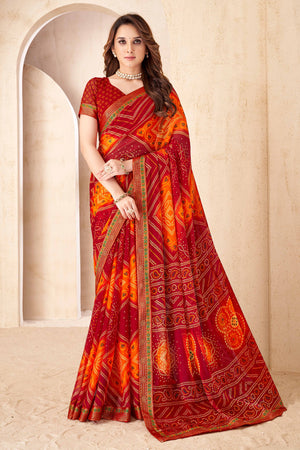 Maroon & Orange Bandhani Printed Chiffon Saree Enhanced with Delicate Lace Border Work