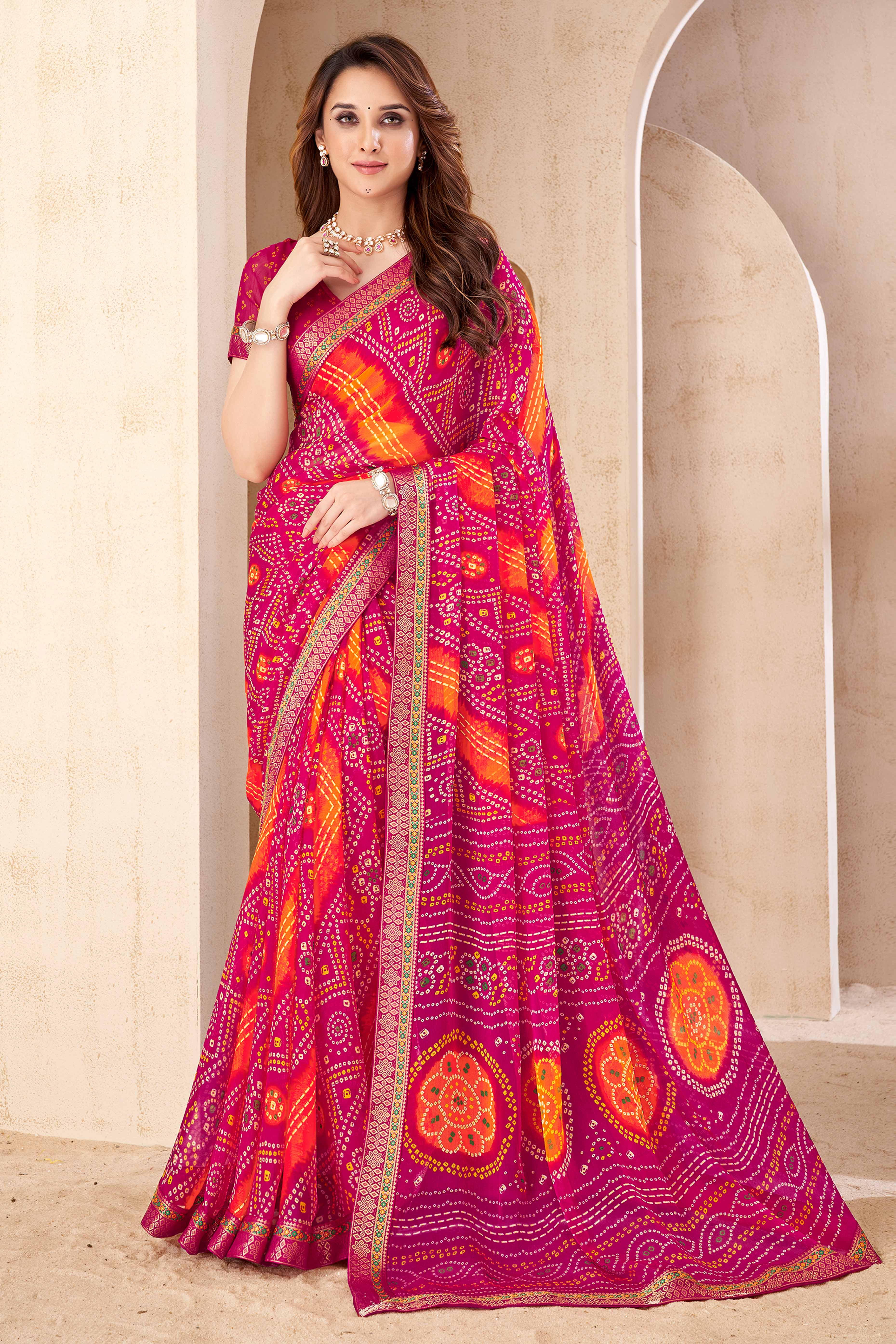 Magenta Bandhani Printed Chiffon Saree Enhanced with Delicate Lace Border Work