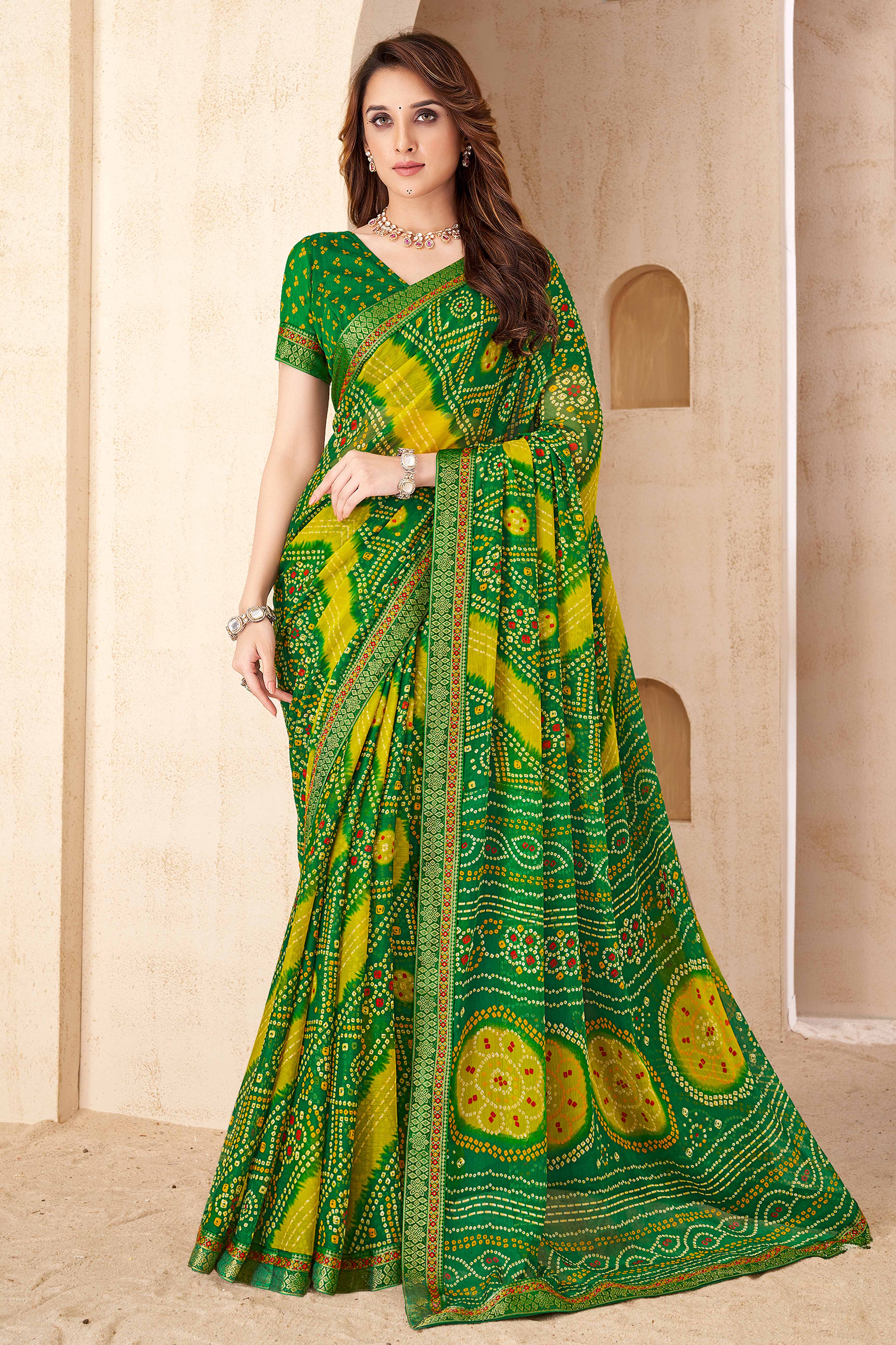 Green Bandhani Printed Chiffon Saree Enhanced with Delicate Lace Border Work