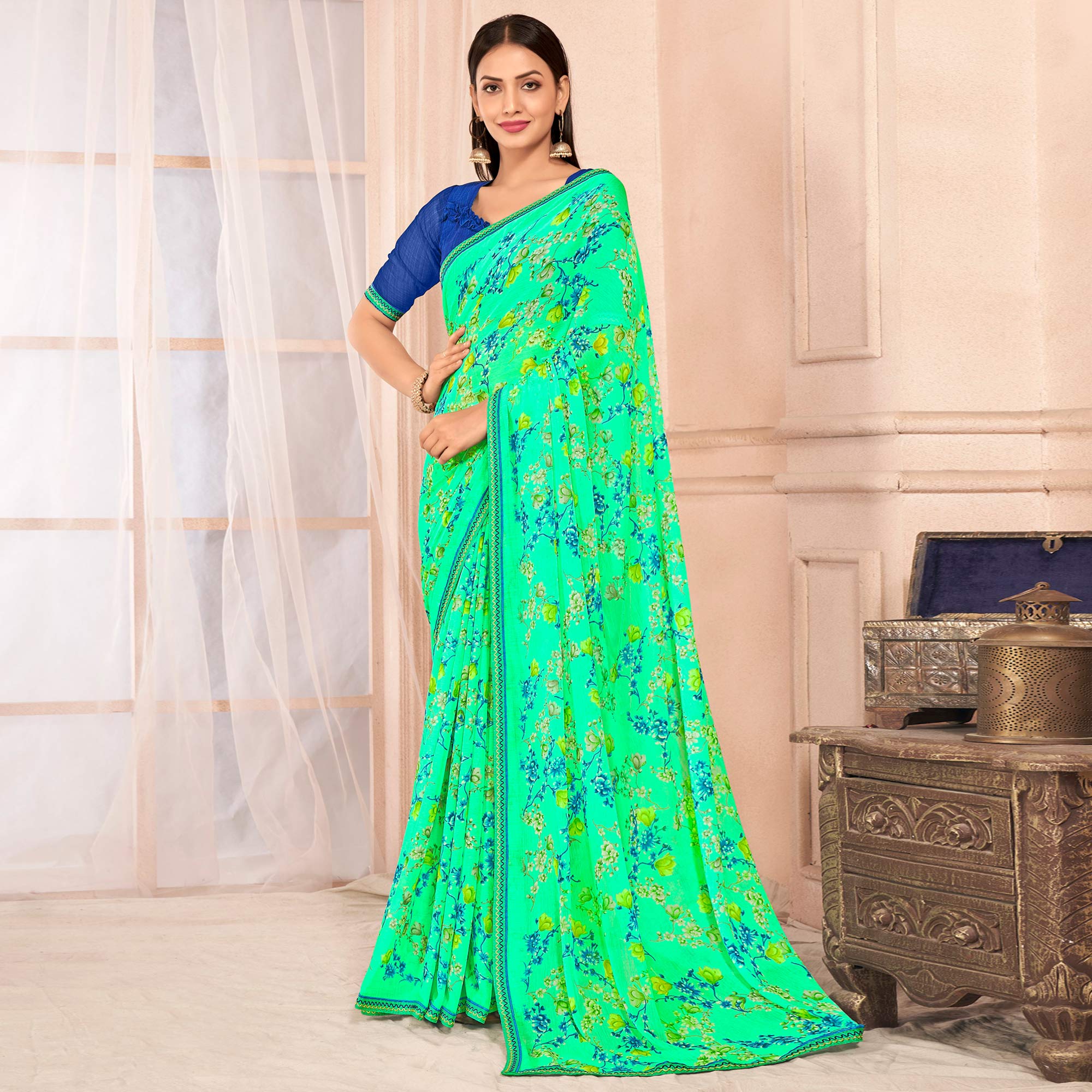 Mint Green Floral Printed Chiffon Saree With Lace Border