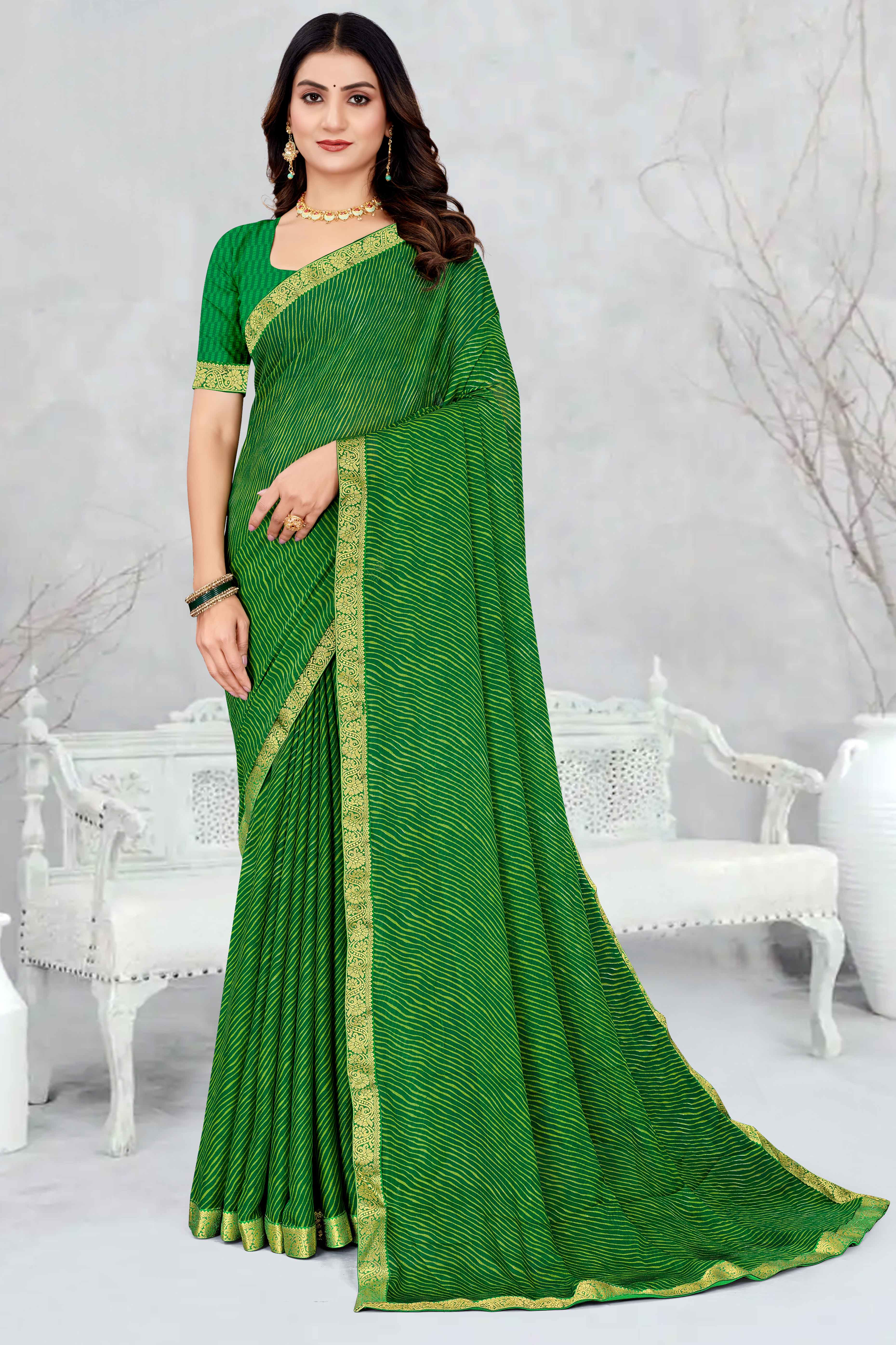 Green Leheriya Printed Chiffon Saree Accented With A Graceful Floral Weaving Lace Border