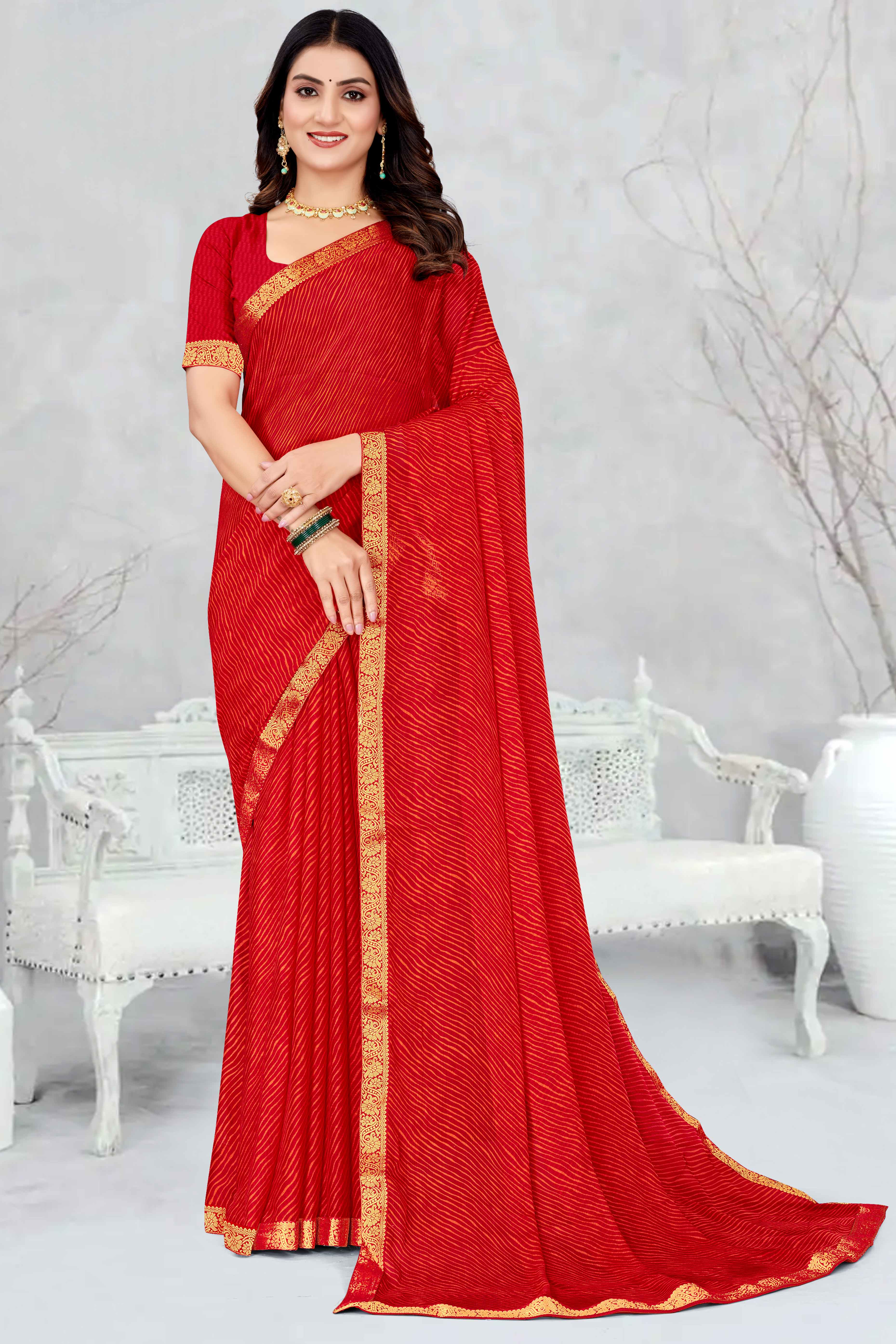 Red Leheriya Printed Chiffon Saree Accented With A Graceful Floral Weaving Lace Border