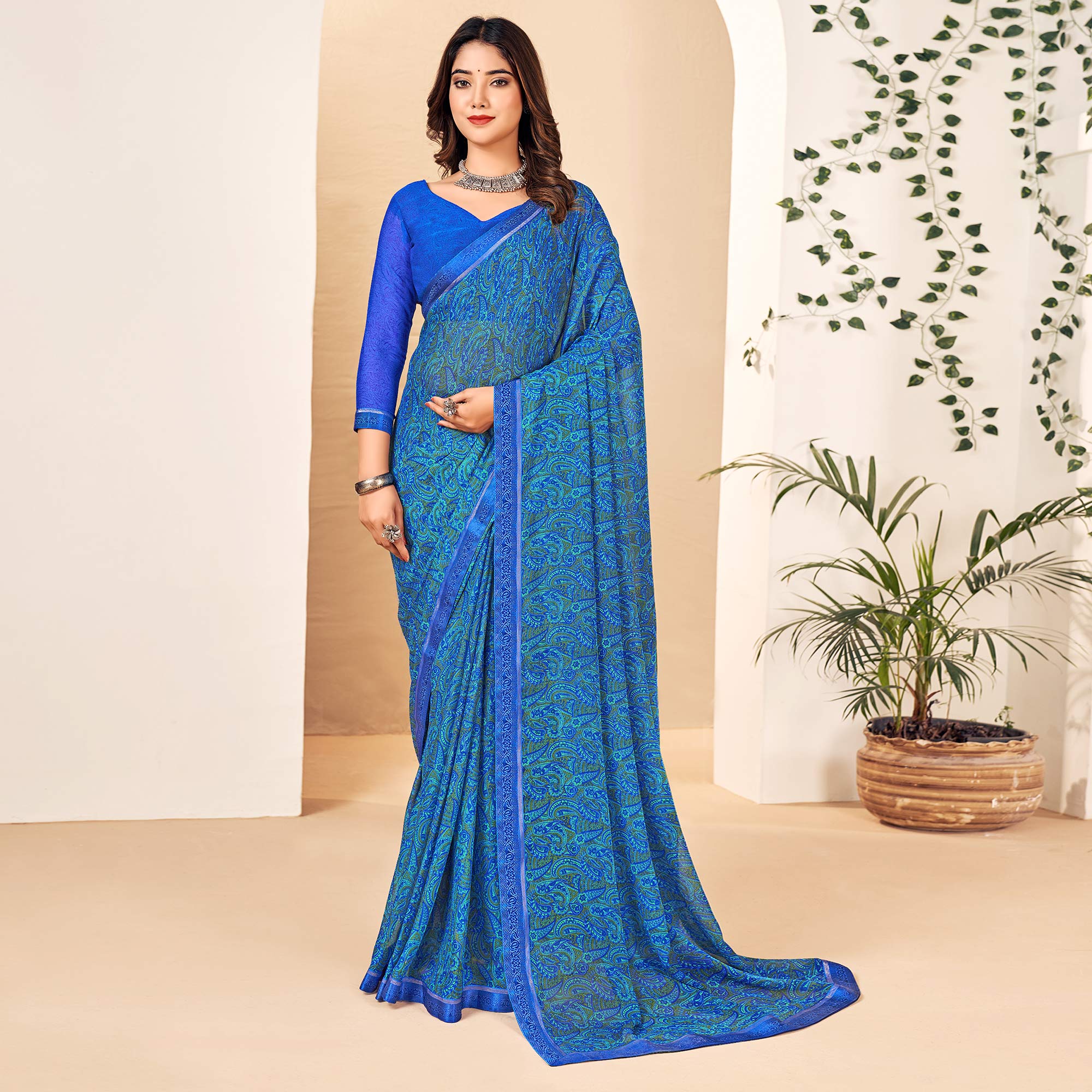 Blue Floral Printed Chiffon Saree With Lace Border