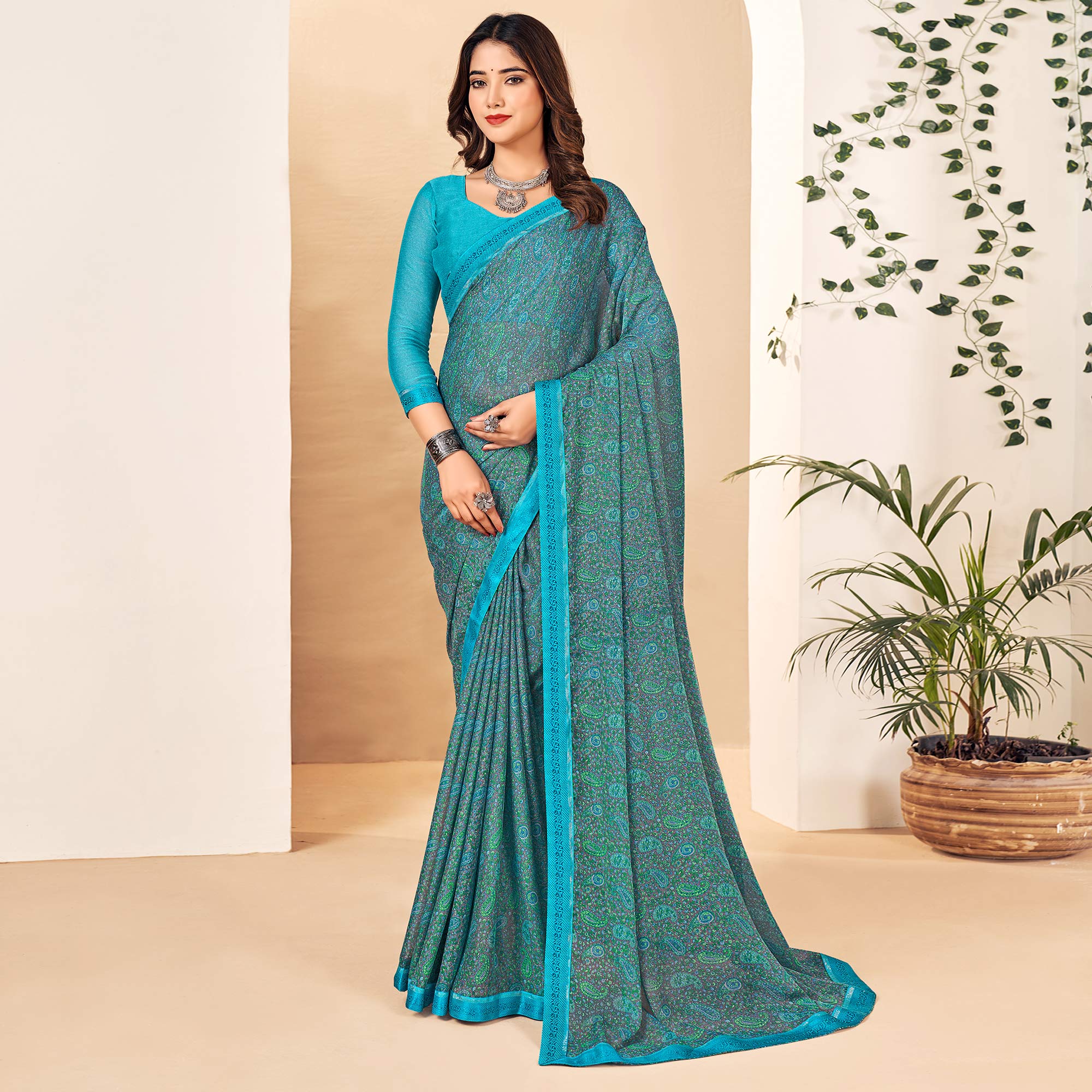 Sky Blue Floral Printed Chiffon Saree With Lace Border